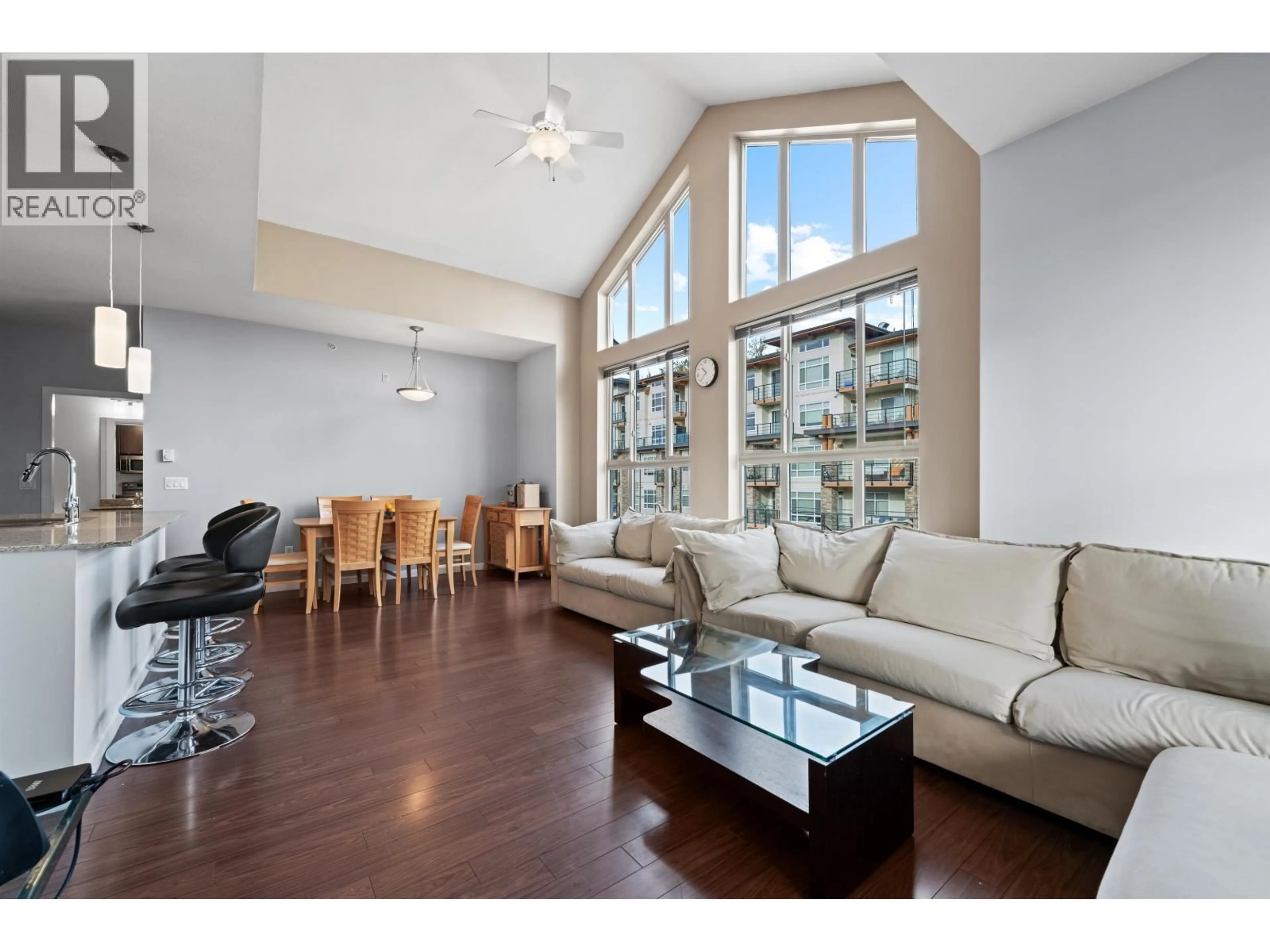 Living room with furniture, wood/laminate floor for 414 - 2484 WILSON AVENUE, Port Coquitlam British Columbia V3C0A5