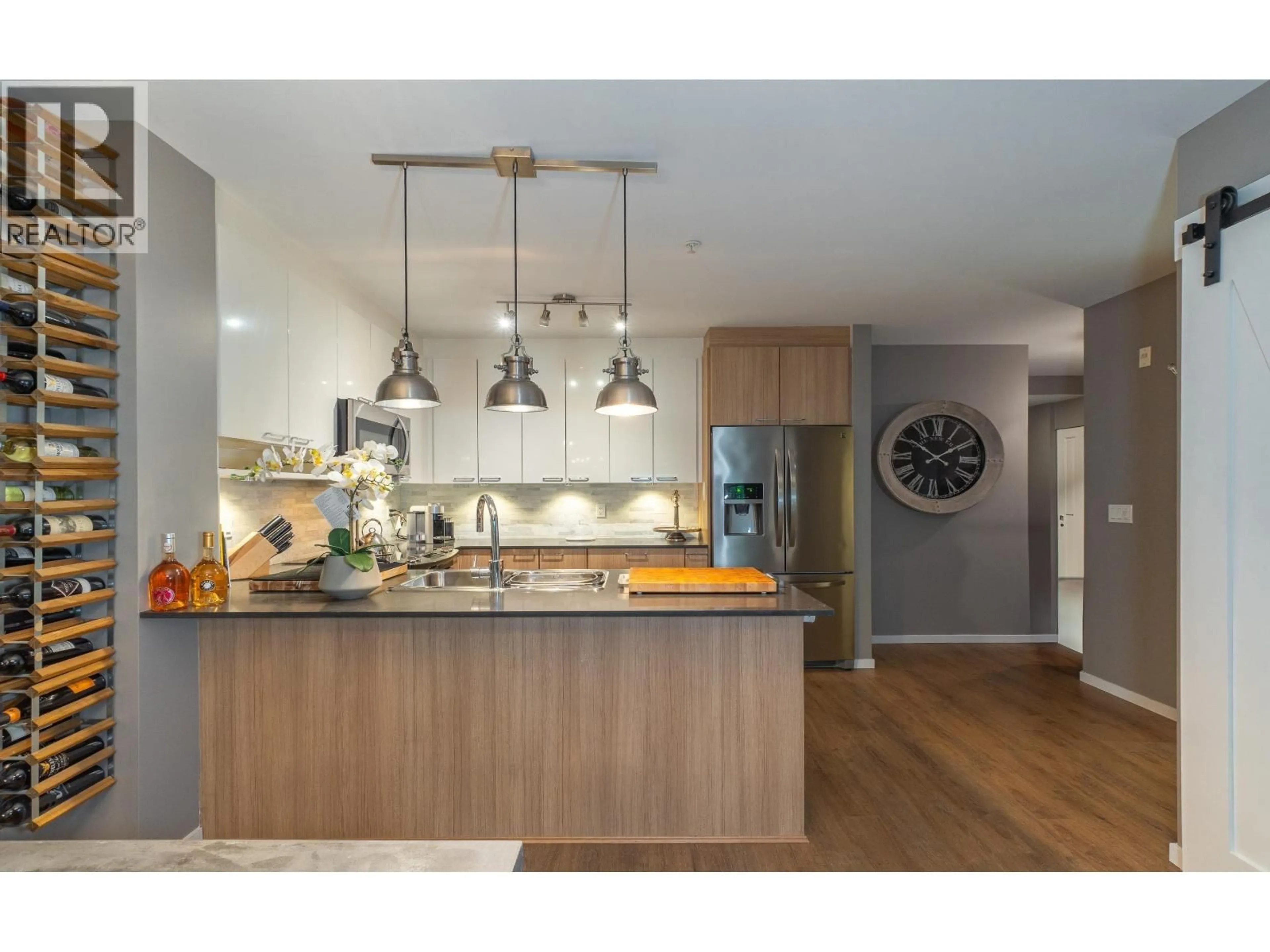 Open concept kitchen, wood/laminate floor for 202 - 210 LEBLEU STREET, Coquitlam British Columbia V3K4L6