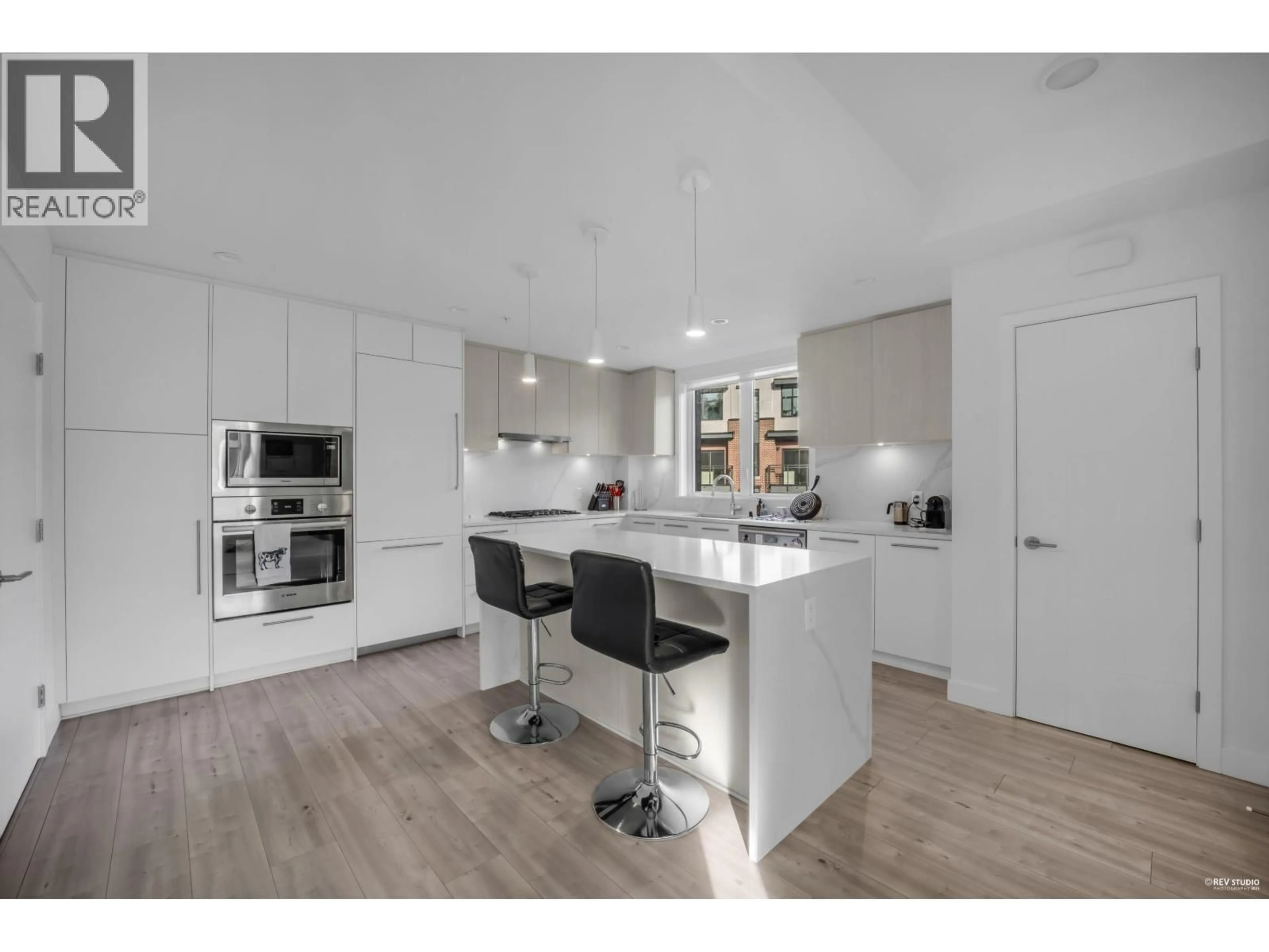 Open concept kitchen, unknown for 247 - 2035 GLENAIRE DRIVE, North Vancouver British Columbia V7P1Y2