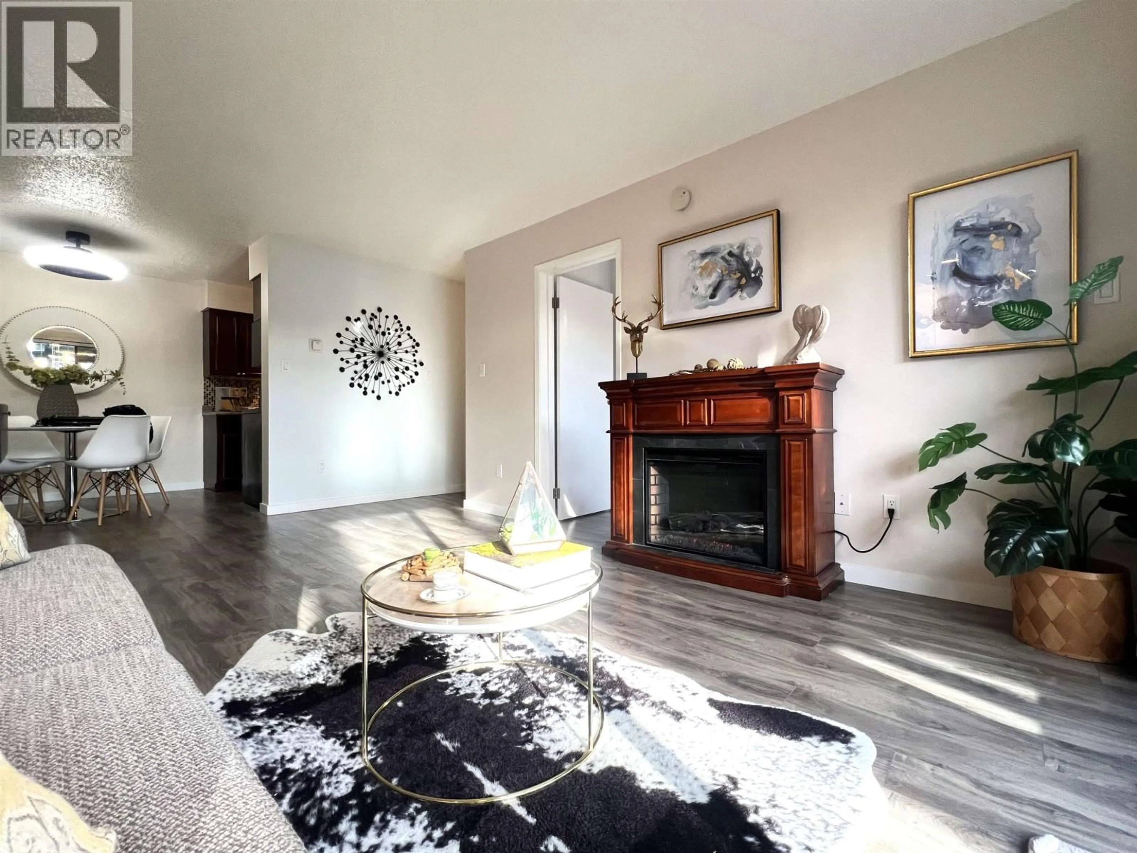 Living room with furniture, unknown for 104 - 8775 CARTIER STREET, Vancouver British Columbia V6P4V3