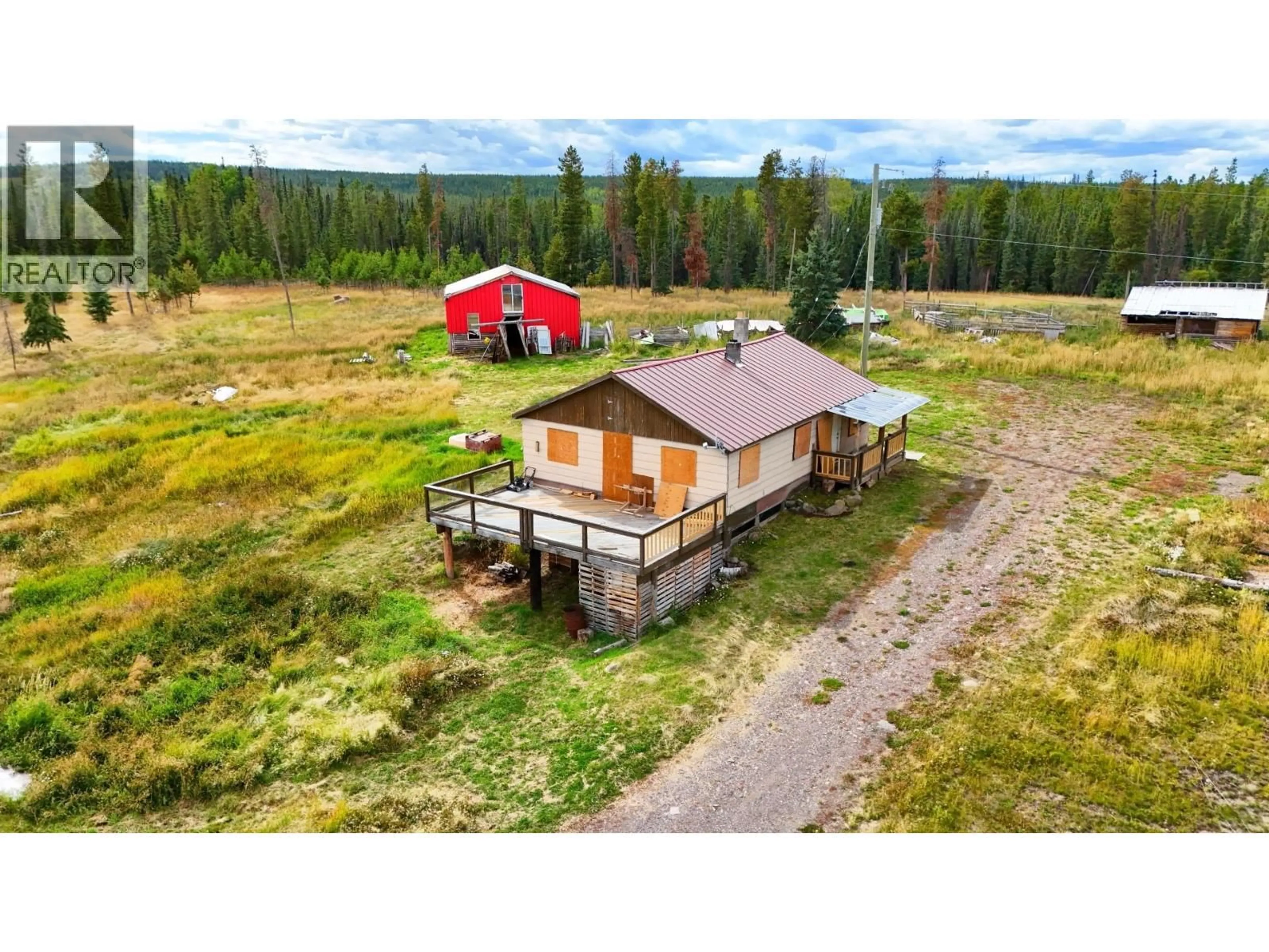 A pic from outside/outdoor area/front of a property/back of a property/a pic from drone, building for 9247 NAZKO ROAD, Bouchie Lake British Columbia V2J3H9