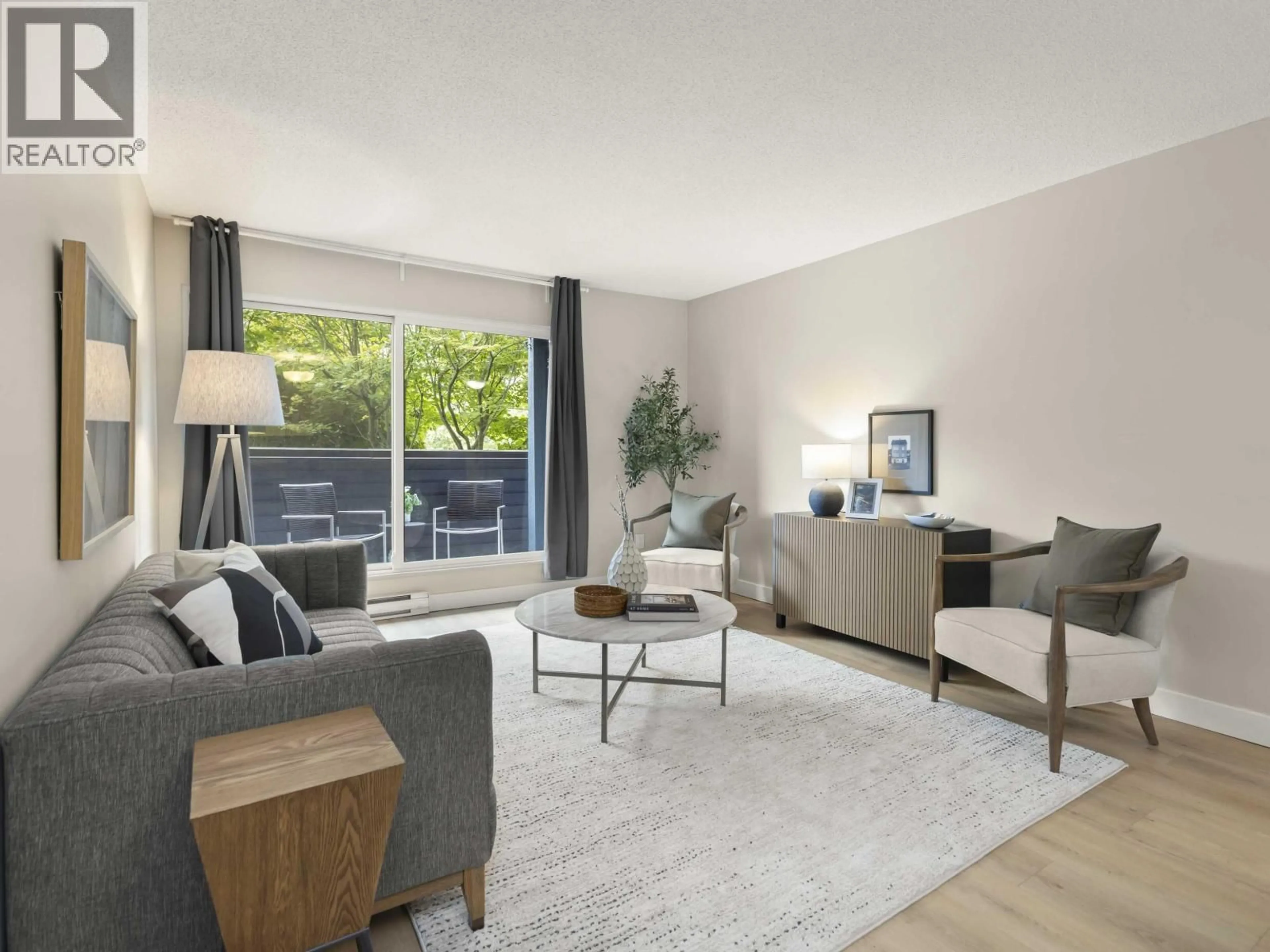 Living room with furniture, wood/laminate floor for 216 - 1990 6TH AVENUE, Vancouver British Columbia V6J4V4