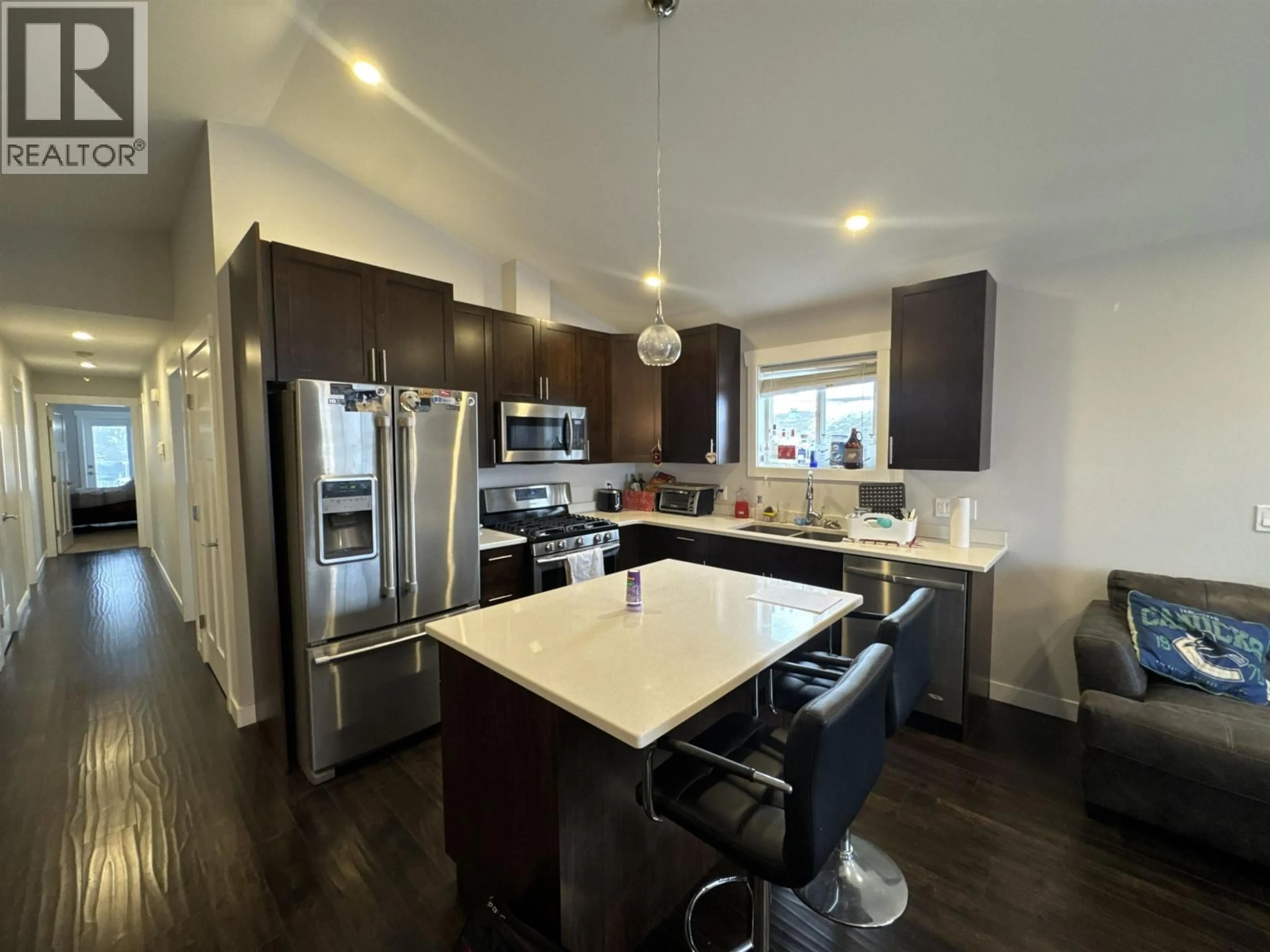 Open concept kitchen, unknown for 8707 76 STREET, Fort St. John British Columbia V1J2Z5