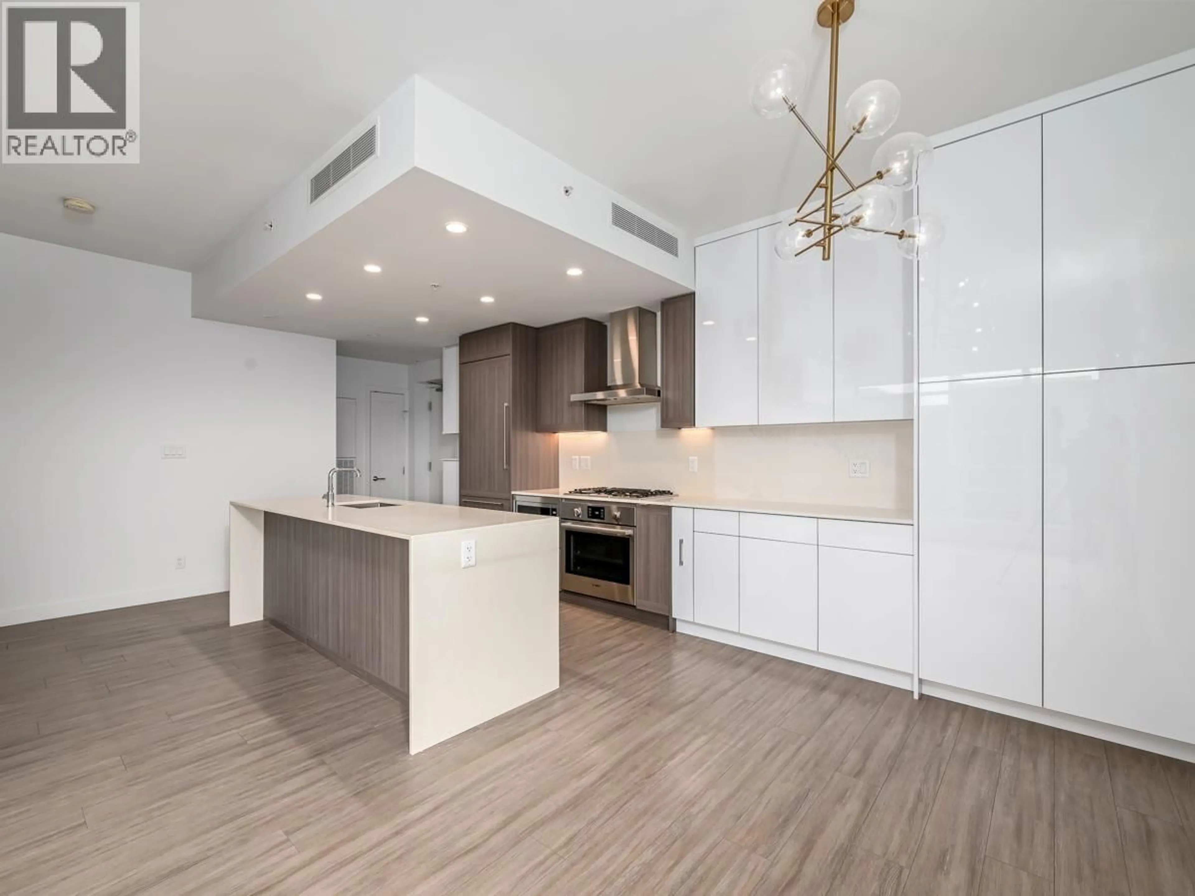 Open concept kitchen, unknown for 301 - 2351 BETA AVENUE, Burnaby British Columbia V5C0M2