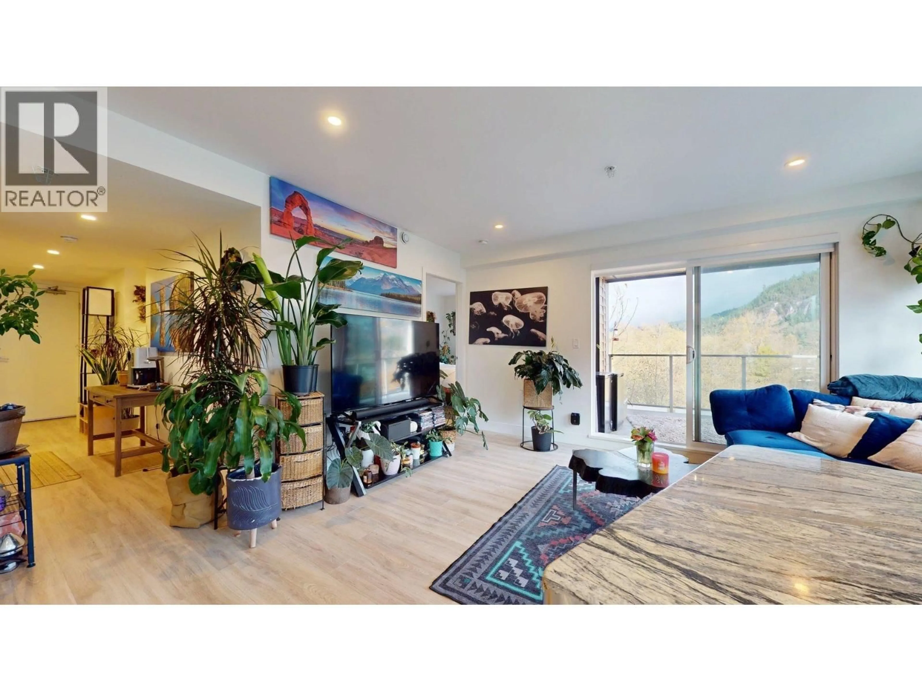 Living room with furniture, wood/laminate floor for 604 - 38362 BUCKLEY AVENUE, Squamish British Columbia V8B0J8