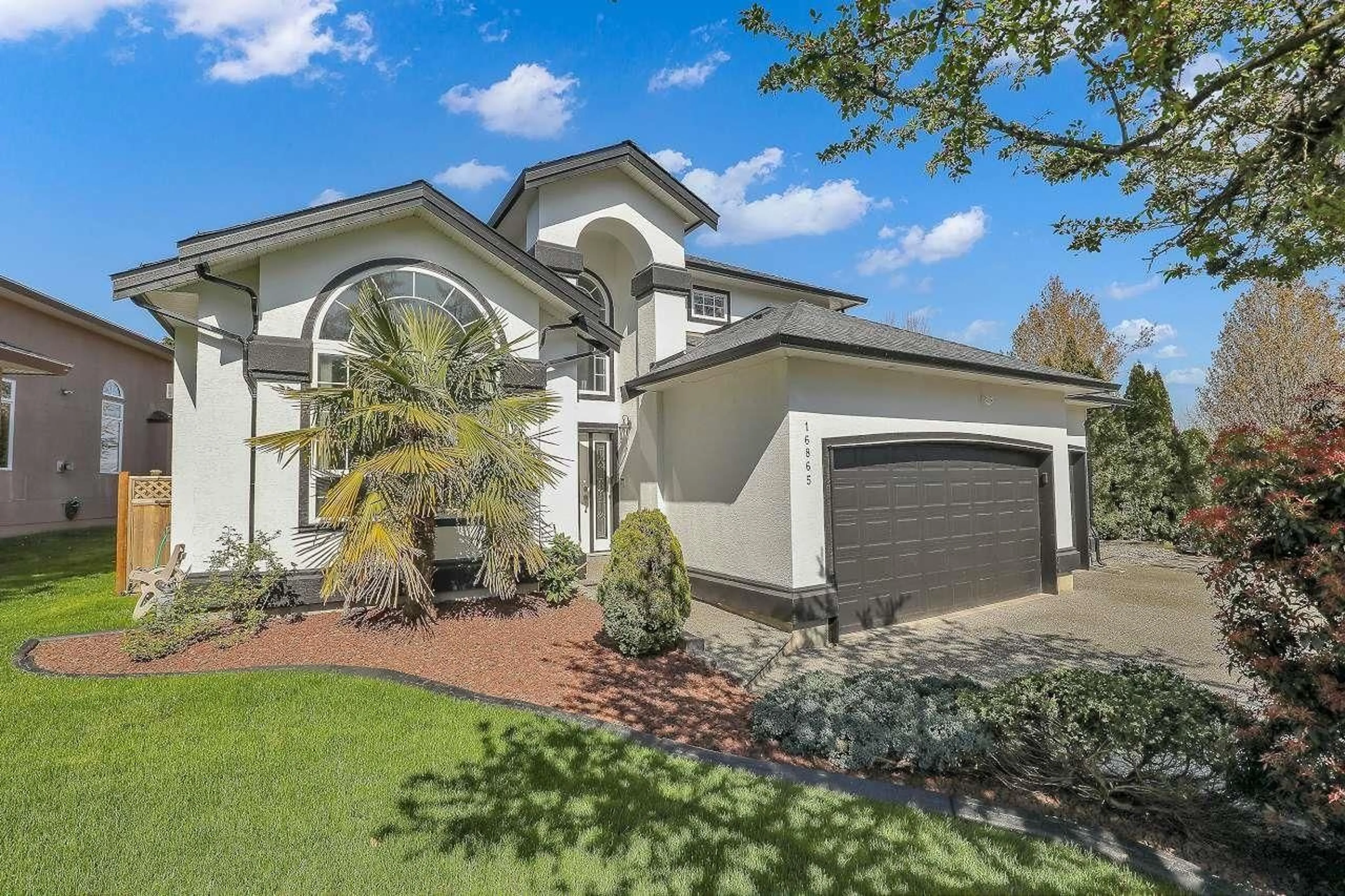 Home with vinyl exterior material, street for 16865 80, Surrey British Columbia V4N4Y8