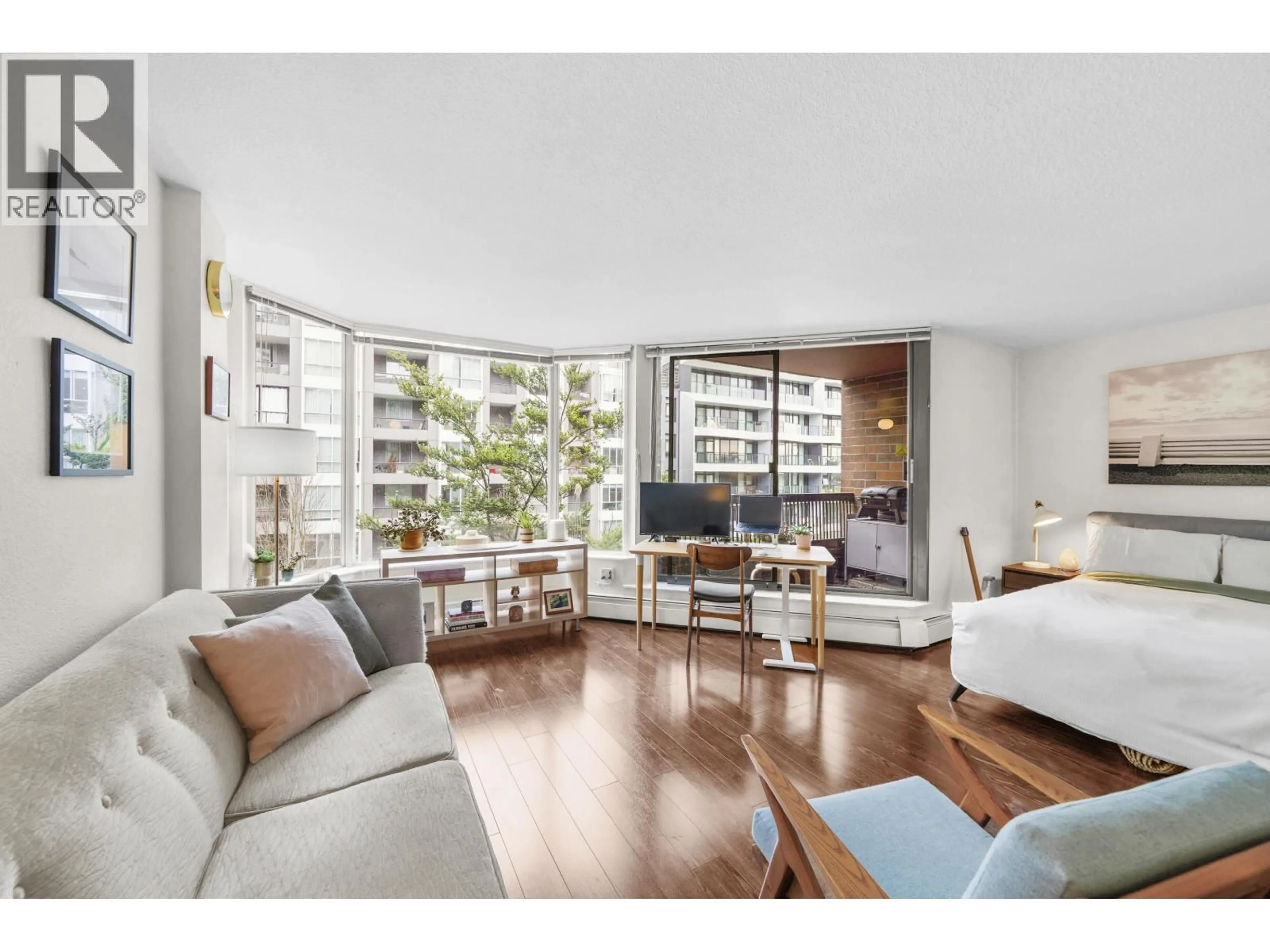 Living room with furniture, wood/laminate floor for 411 - 1333 HORNBY STREET, Vancouver British Columbia V6Z2C1