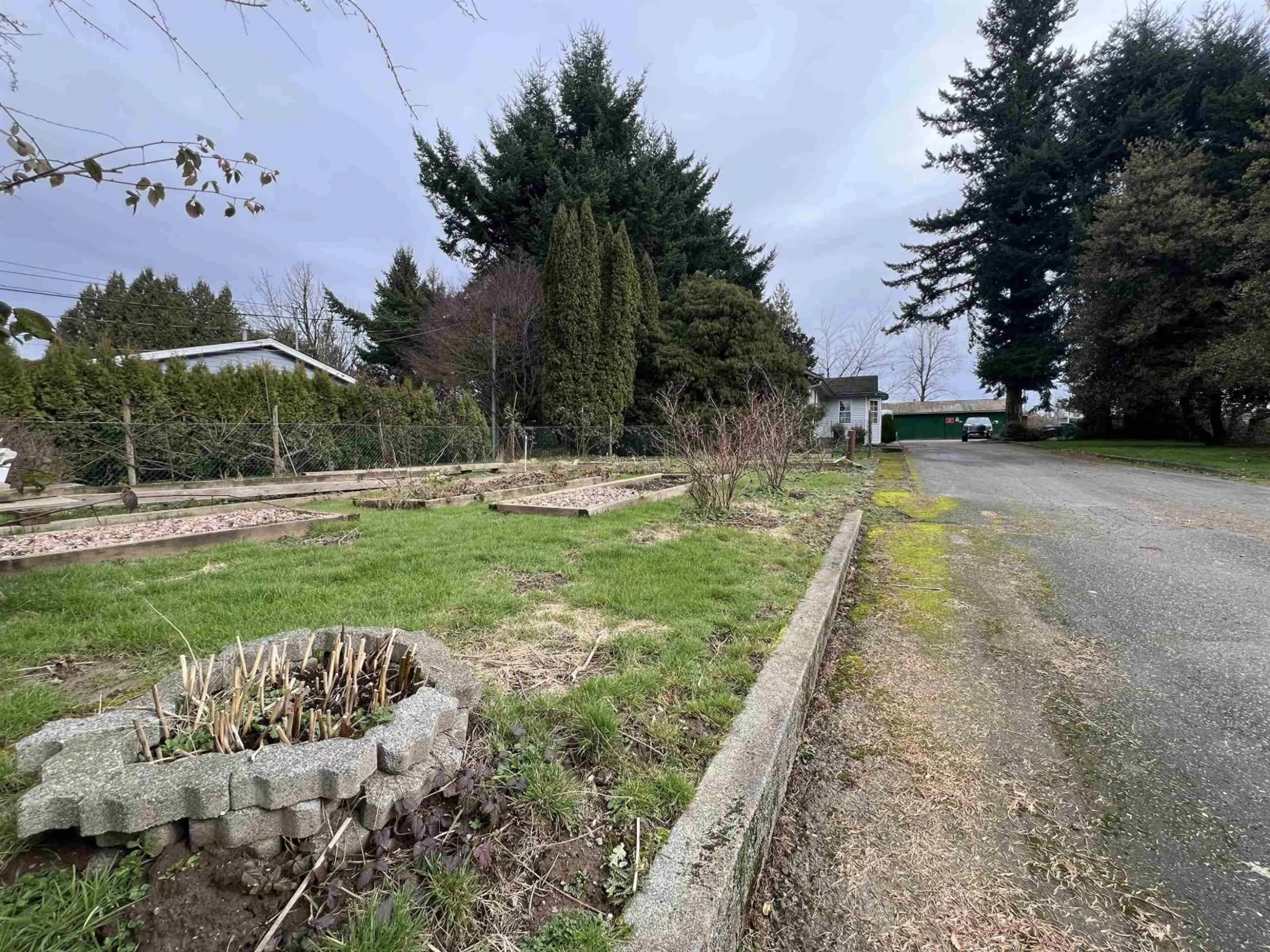 A pic from outside/outdoor area/front of a property/back of a property/a pic from drone, street for 4162 BRADNER ROAD, Abbotsford British Columbia V4X1S8