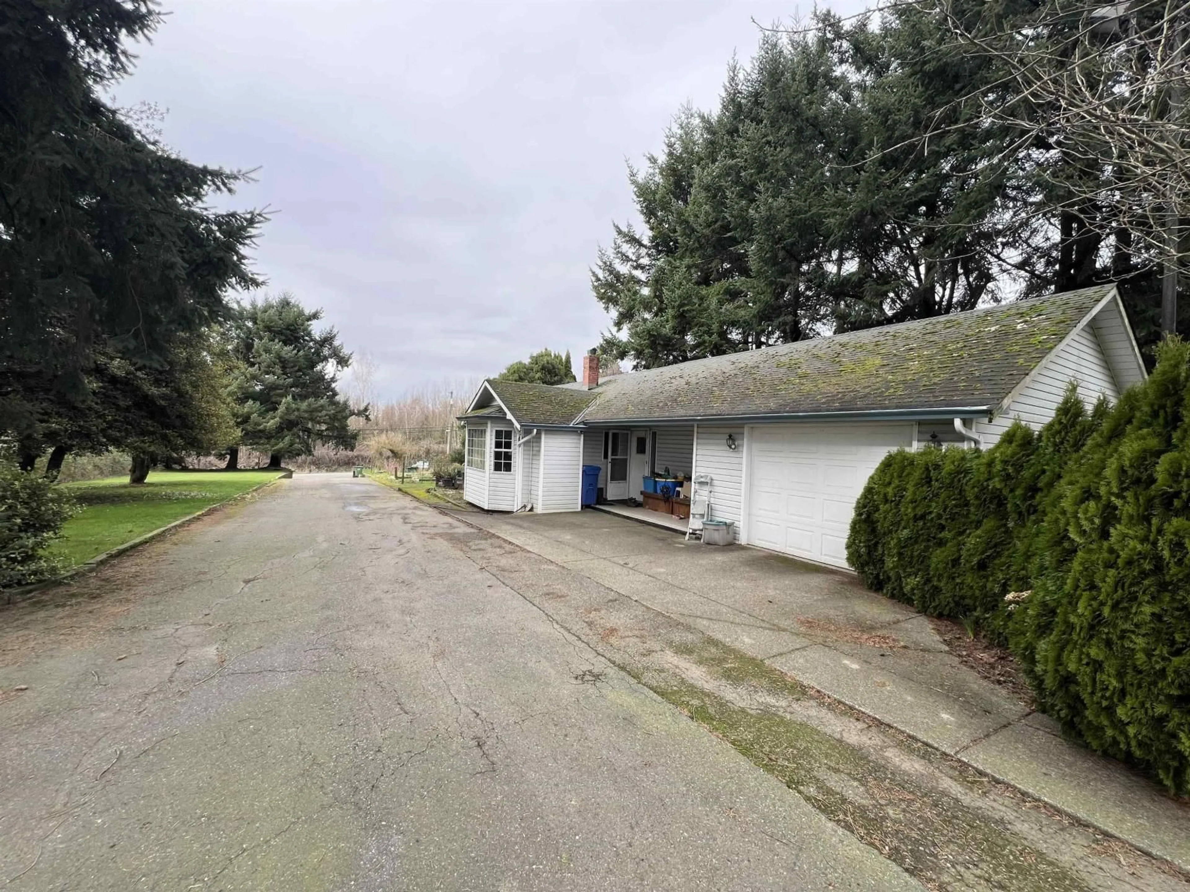 A pic from outside/outdoor area/front of a property/back of a property/a pic from drone, street for 4162 BRADNER ROAD, Abbotsford British Columbia V4X1S8