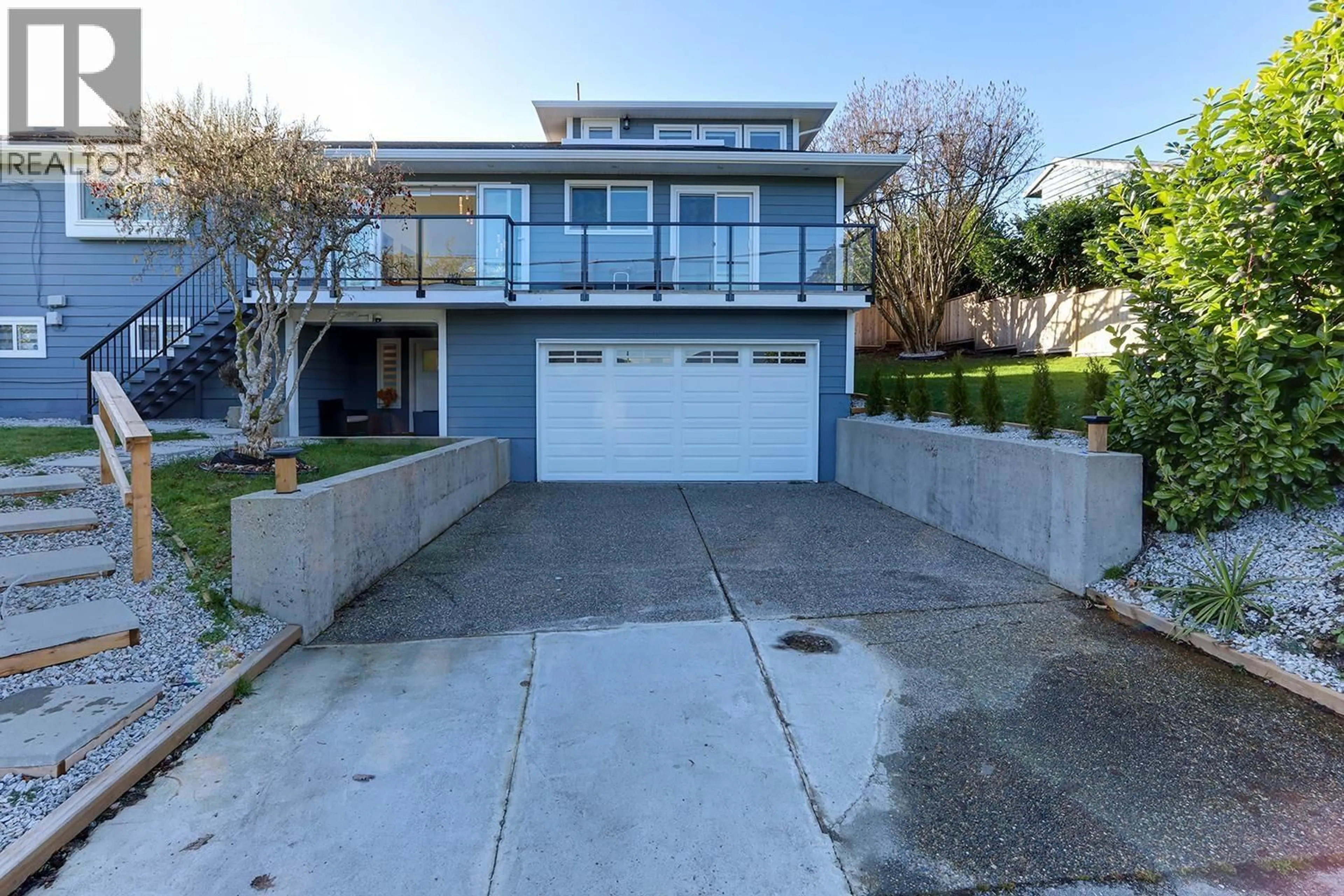 A pic from outside/outdoor area/front of a property/back of a property/a pic from drone, street for 4254 CADDY ROAD, North Vancouver British Columbia V7G1B7