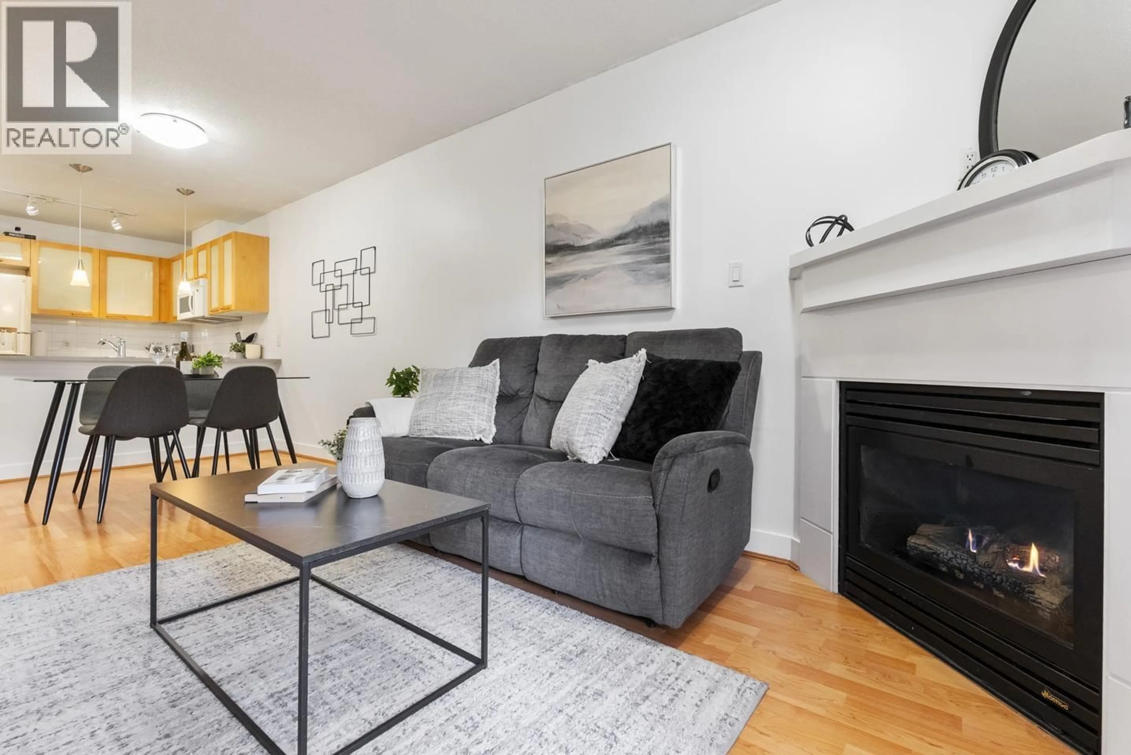 Living room with furniture, wood/laminate floor for 110 - 9333 ALBERTA ROAD, Richmond British Columbia V6Y4E4