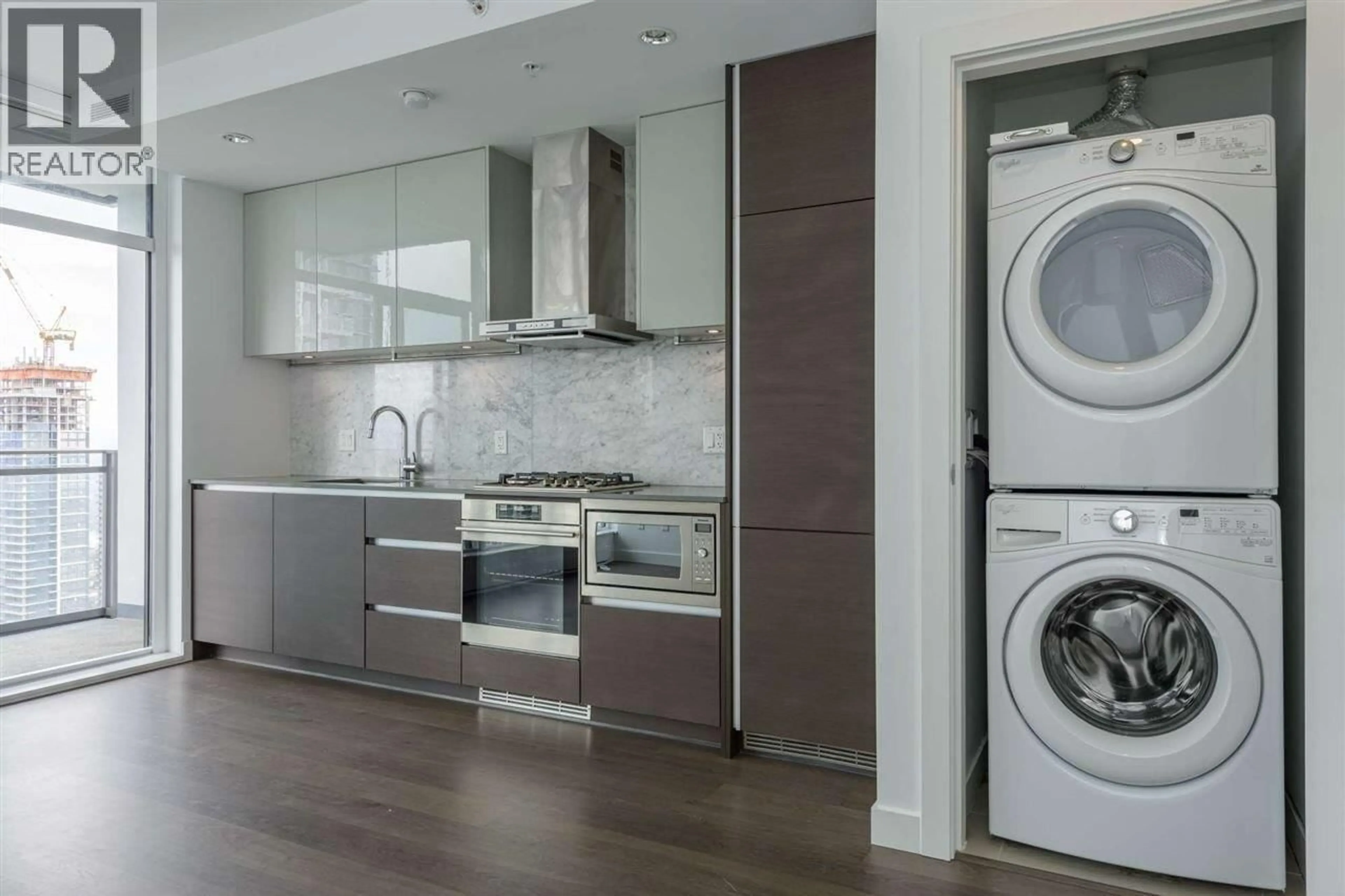 Kitchen with laundary machines, unknown for 3609 - 6098 STATION STREET, Burnaby British Columbia V5H0H4