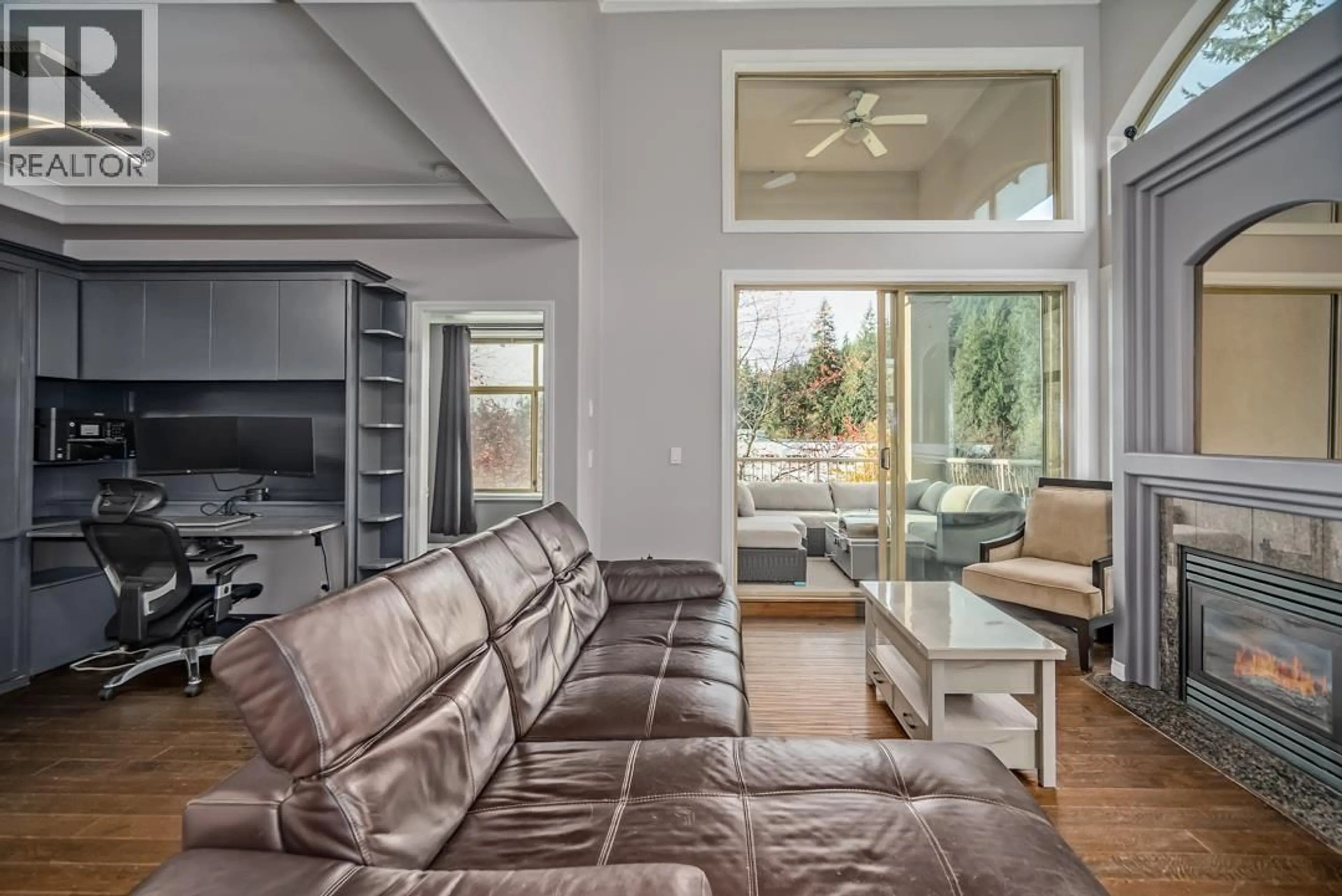 Living room with furniture, unknown for 405 - 3176 PLATEAU BOULEVARD, Coquitlam British Columbia V3E3J2