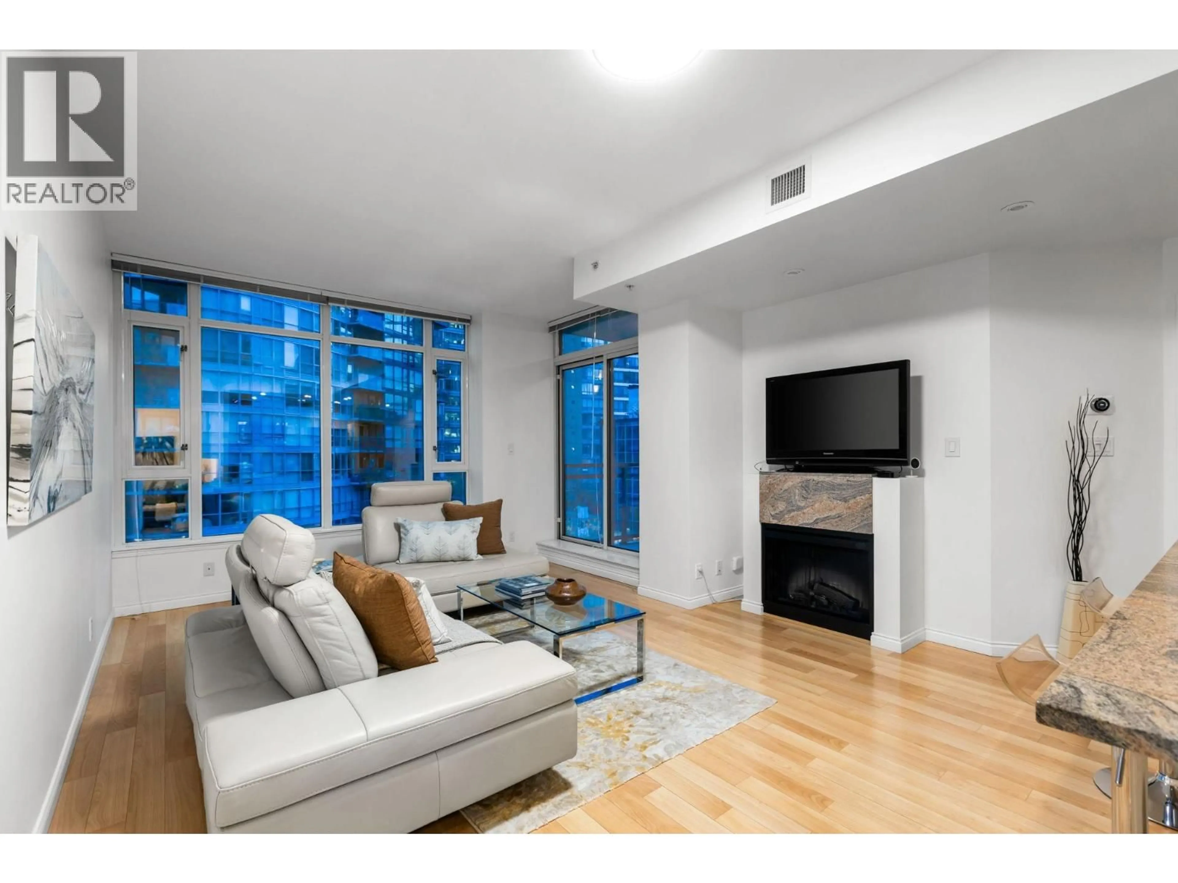 Living room with furniture, unknown for 807 - 1211 MELVILLE STREET, Vancouver British Columbia V6E0A7