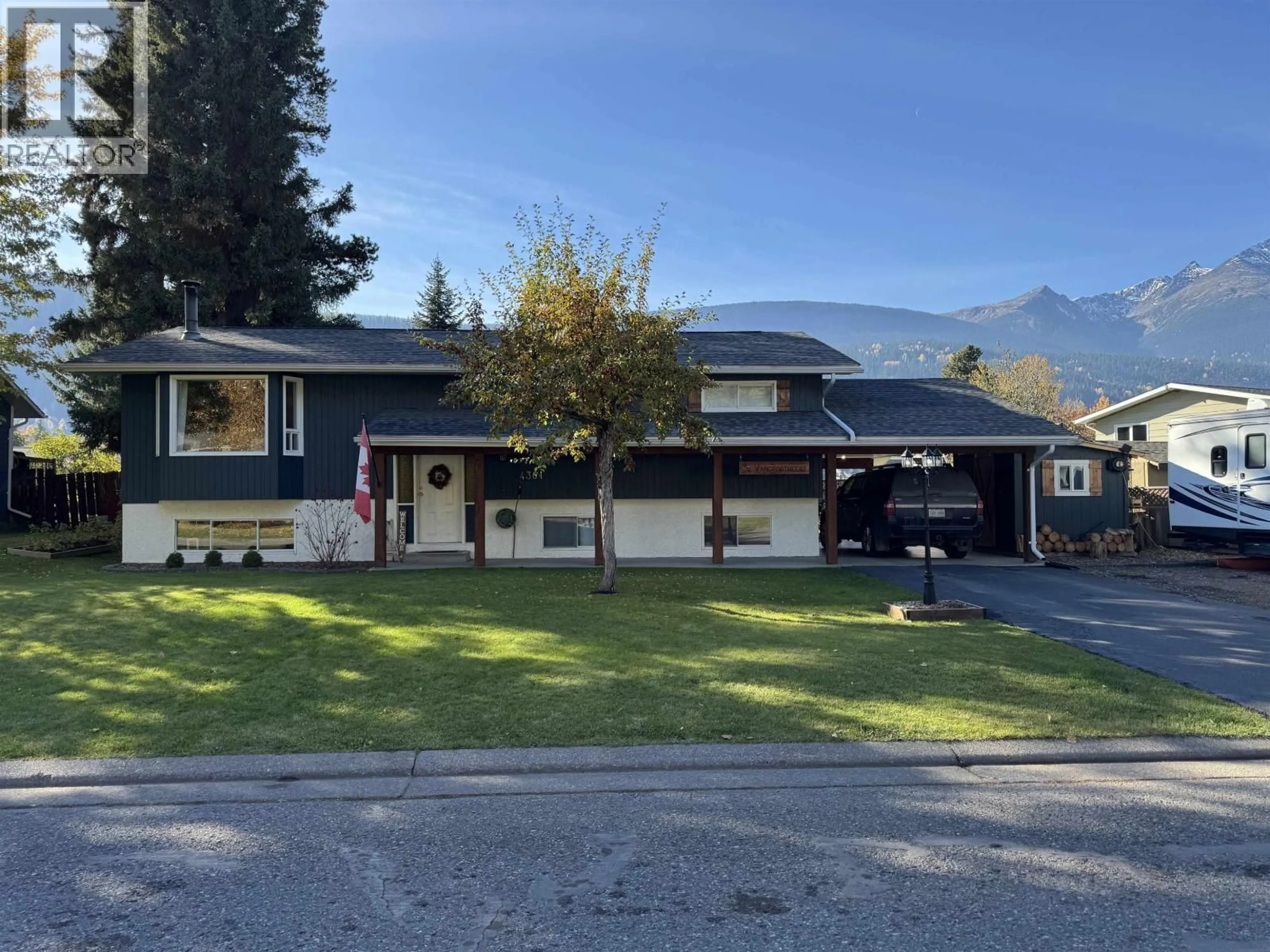A pic from outside/outdoor area/front of a property/back of a property/a pic from drone, mountain view for 4381 BIRCH CRESCENT, Smithers British Columbia V0J2N0