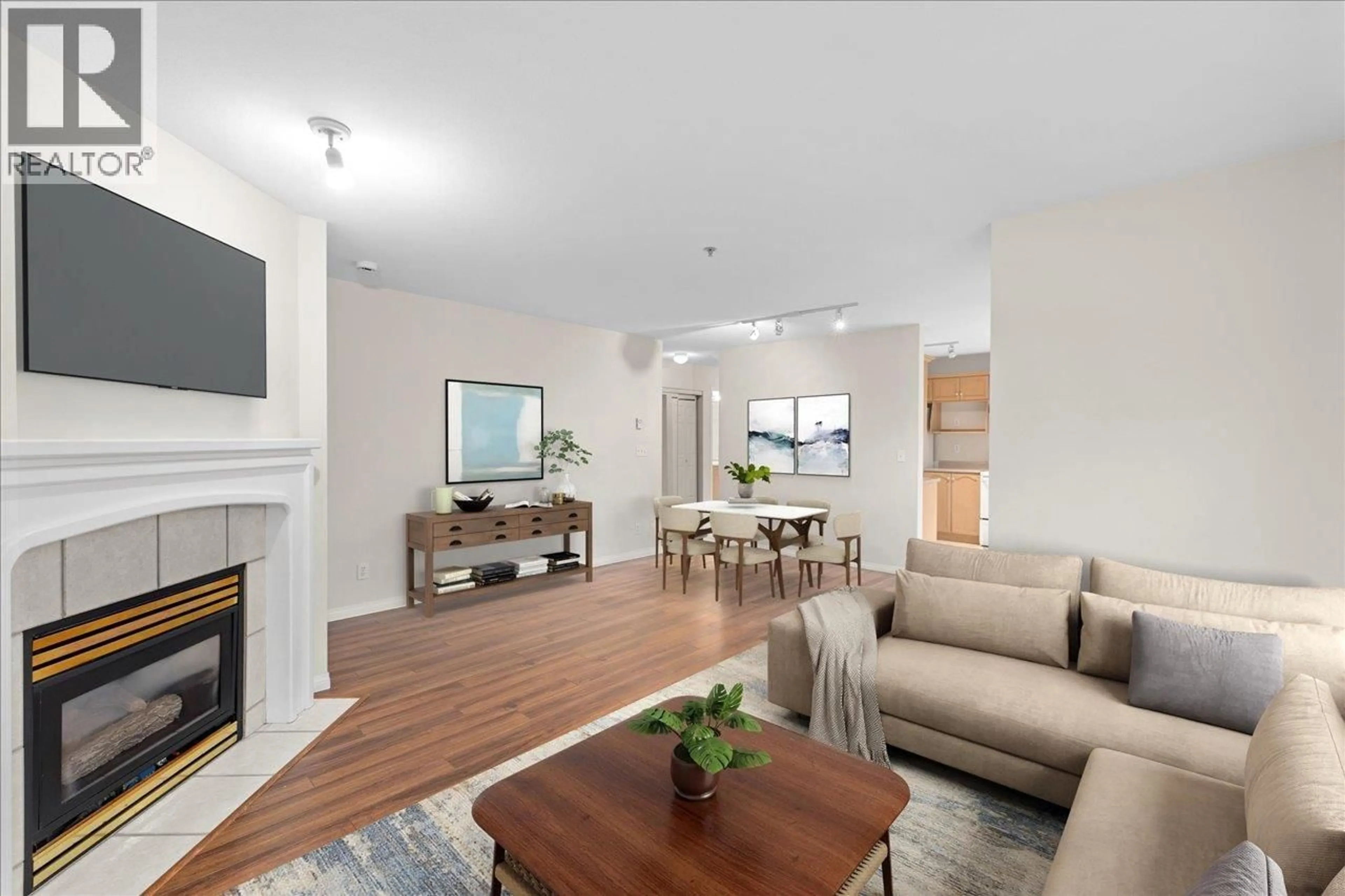 Living room with furniture, wood/laminate floor for 208 - 301 MAUDE ROAD, Port Moody British Columbia V3H5B1