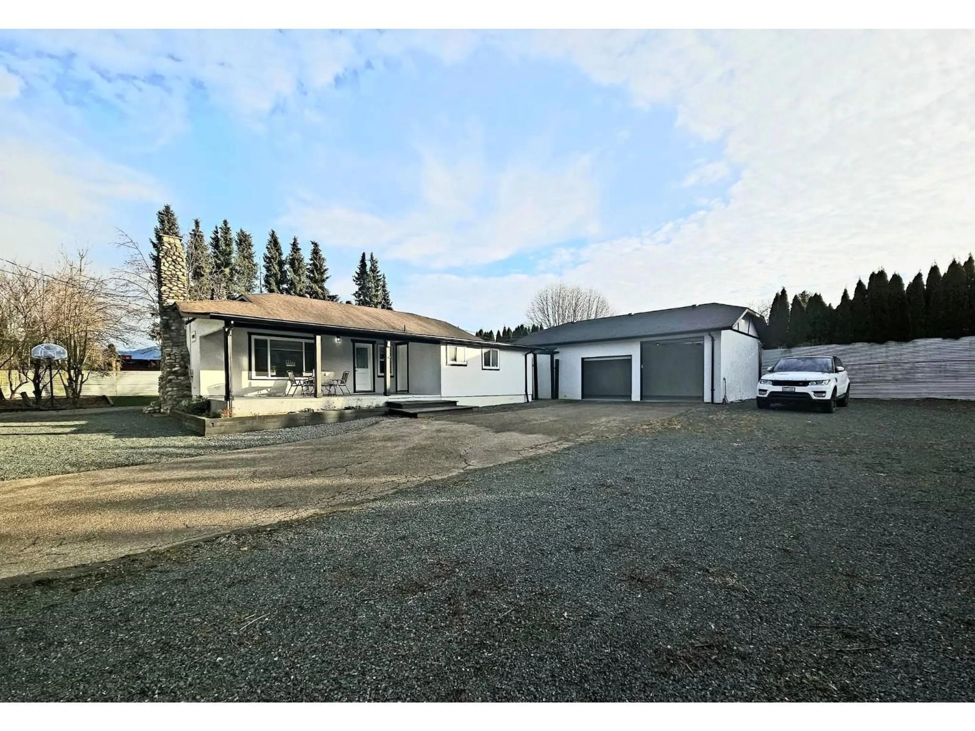 A pic from outside/outdoor area/front of a property/back of a property/a pic from drone, building for 7088 SUMAS PRAIRIE ROAD, Sardis - Greendale British Columbia V2R4K1
