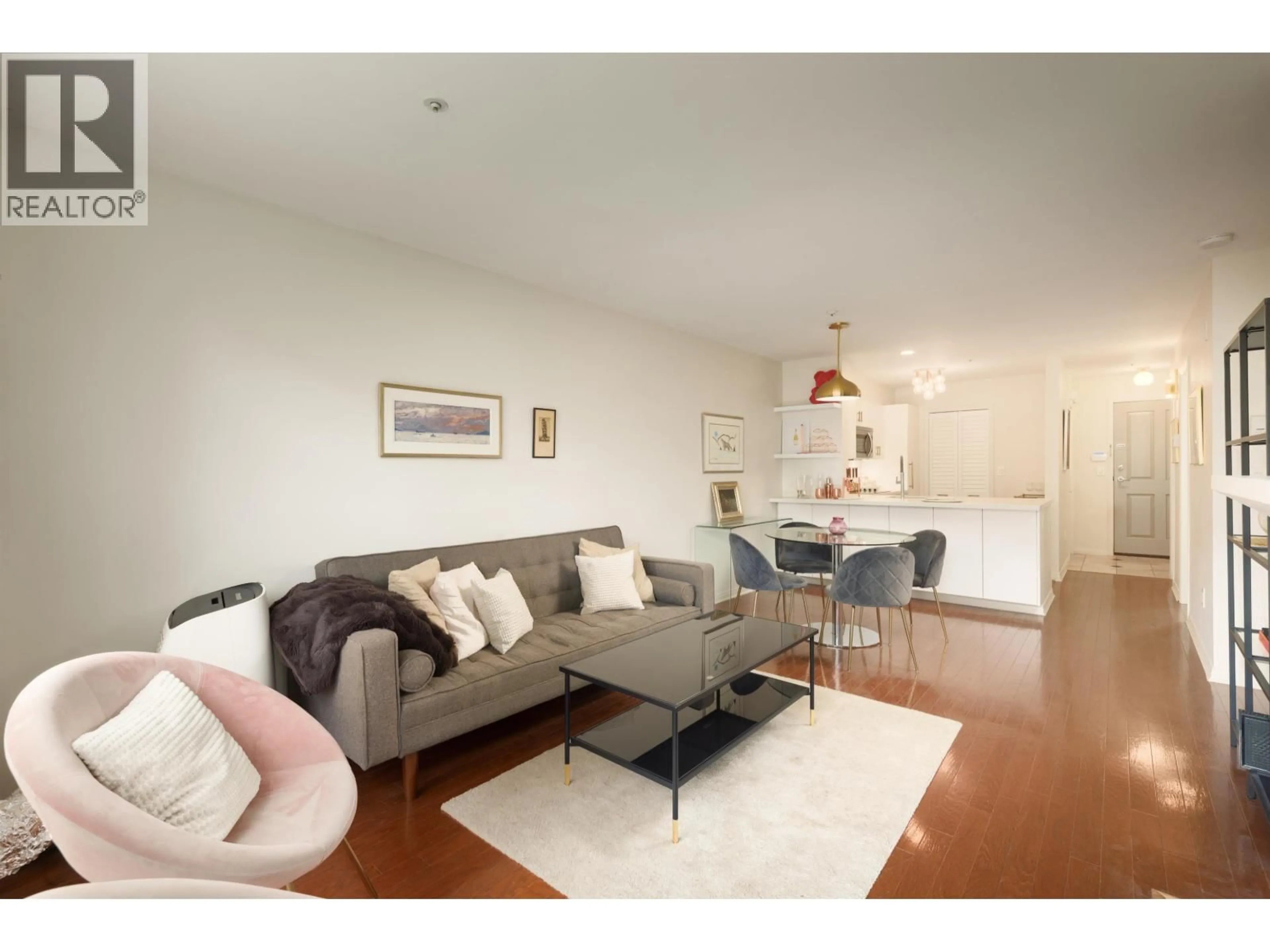 Living room with furniture, wood/laminate floor for 204 - 2575 4TH AVENUE, Vancouver British Columbia V6K1P5