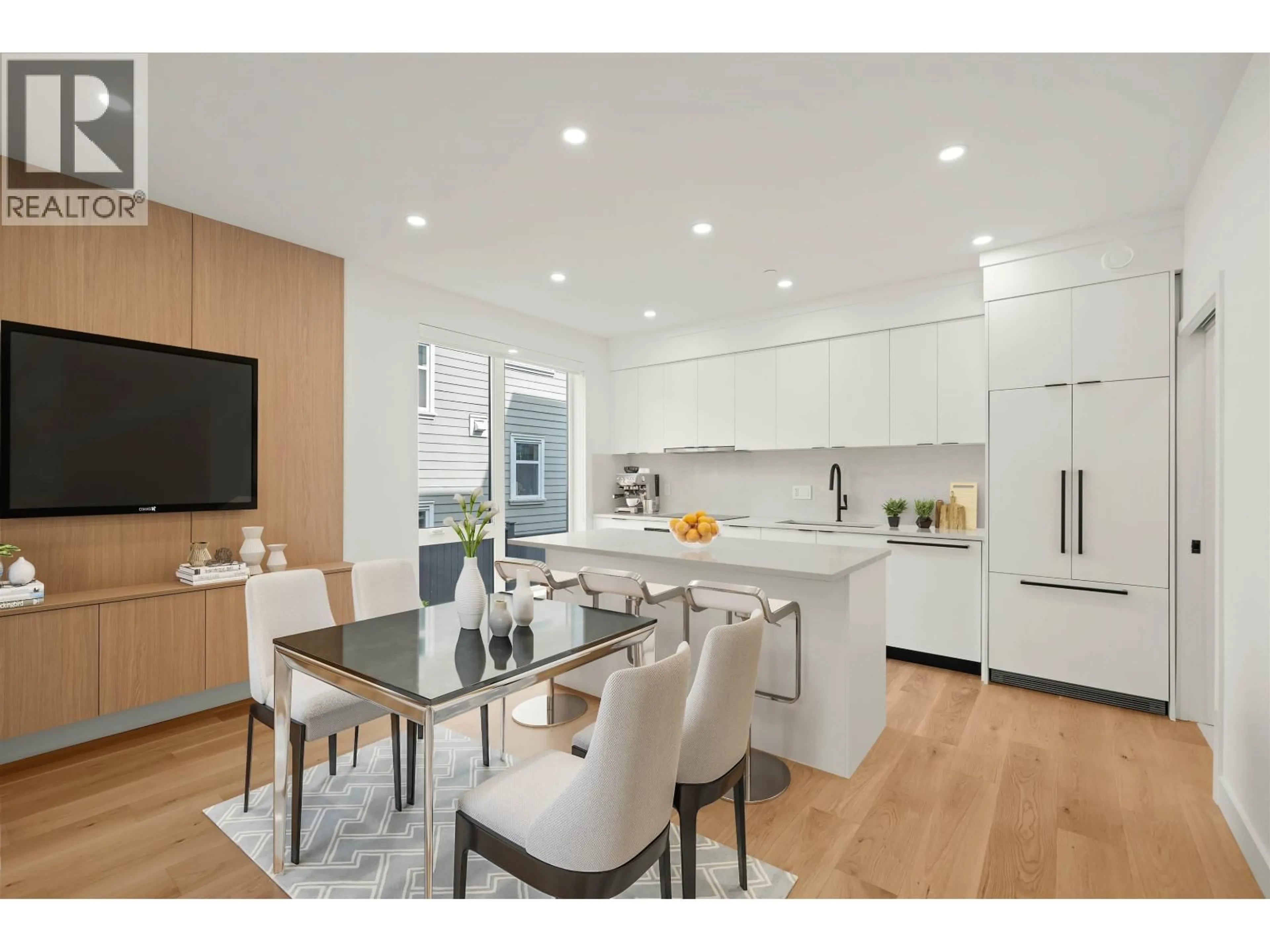 Open concept kitchen, wood/laminate floor for 1904 8TH AVENUE, Vancouver British Columbia V5N1T8