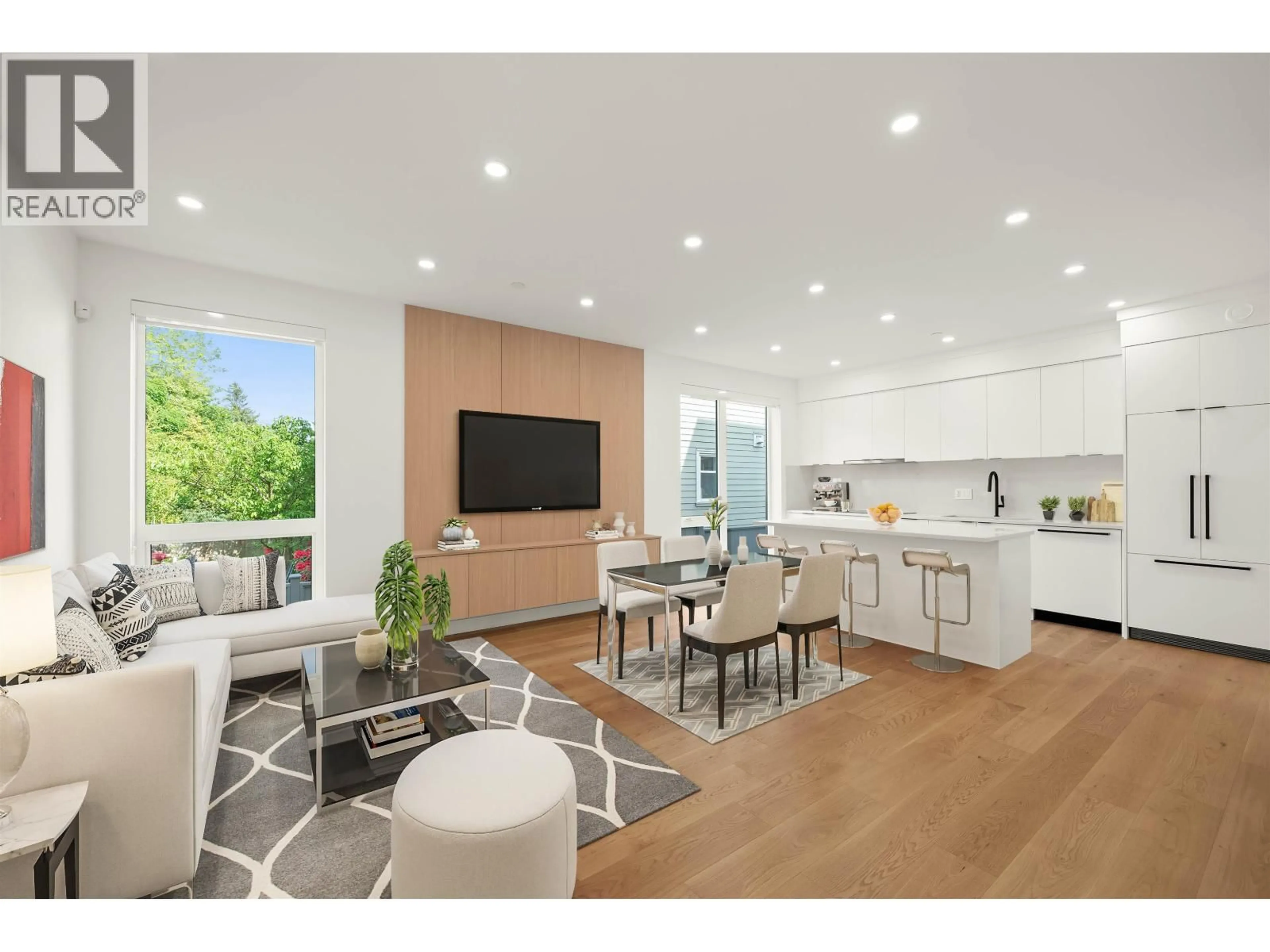 Open concept kitchen, wood/laminate floor for 1904 8TH AVENUE, Vancouver British Columbia V5N1T8