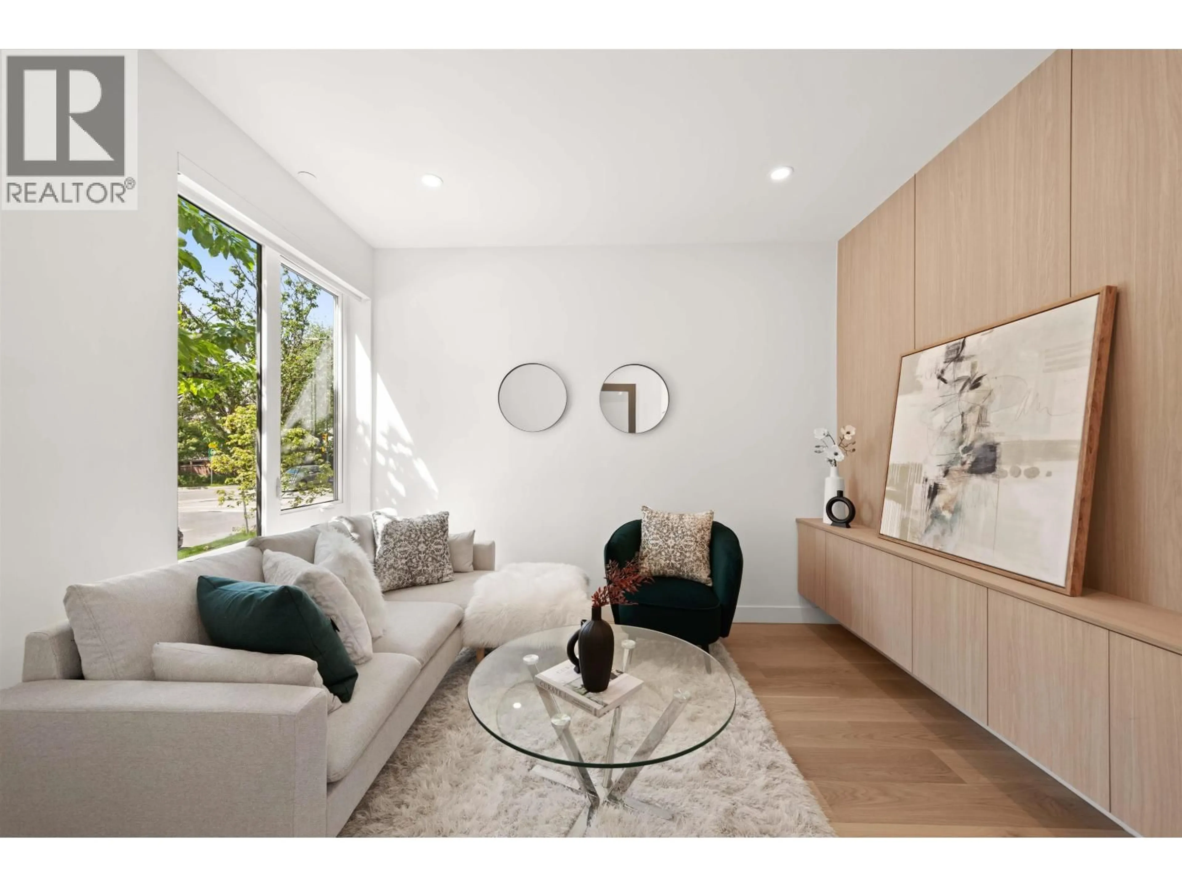 Living room with furniture, wood/laminate floor for 2412 VICTORIA DRIVE, Vancouver British Columbia V5N1T8