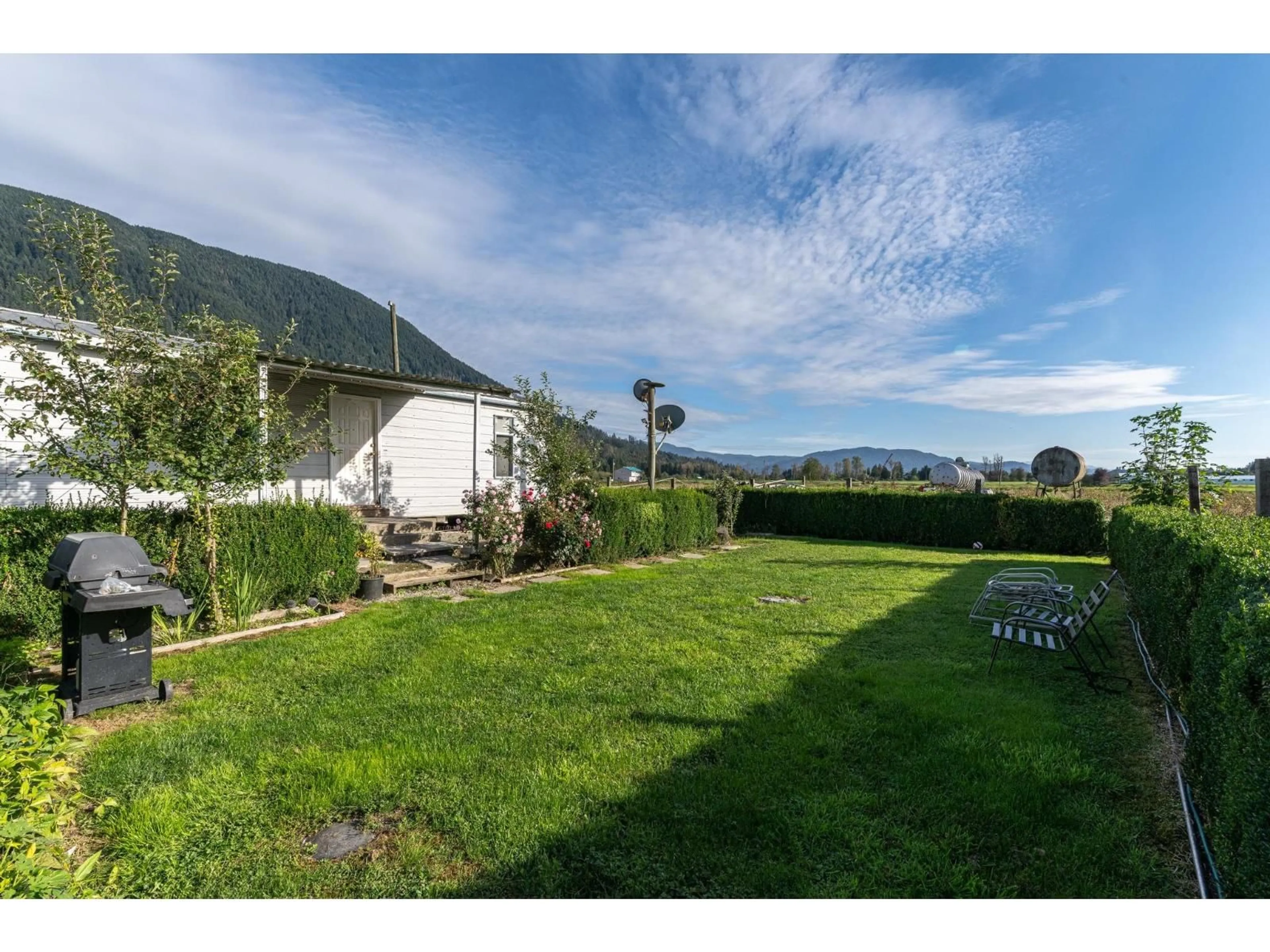 A pic from outside/outdoor area/front of a property/back of a property/a pic from drone, unknown for 10594 FARMS ROAD, Mission British Columbia V2V4J1