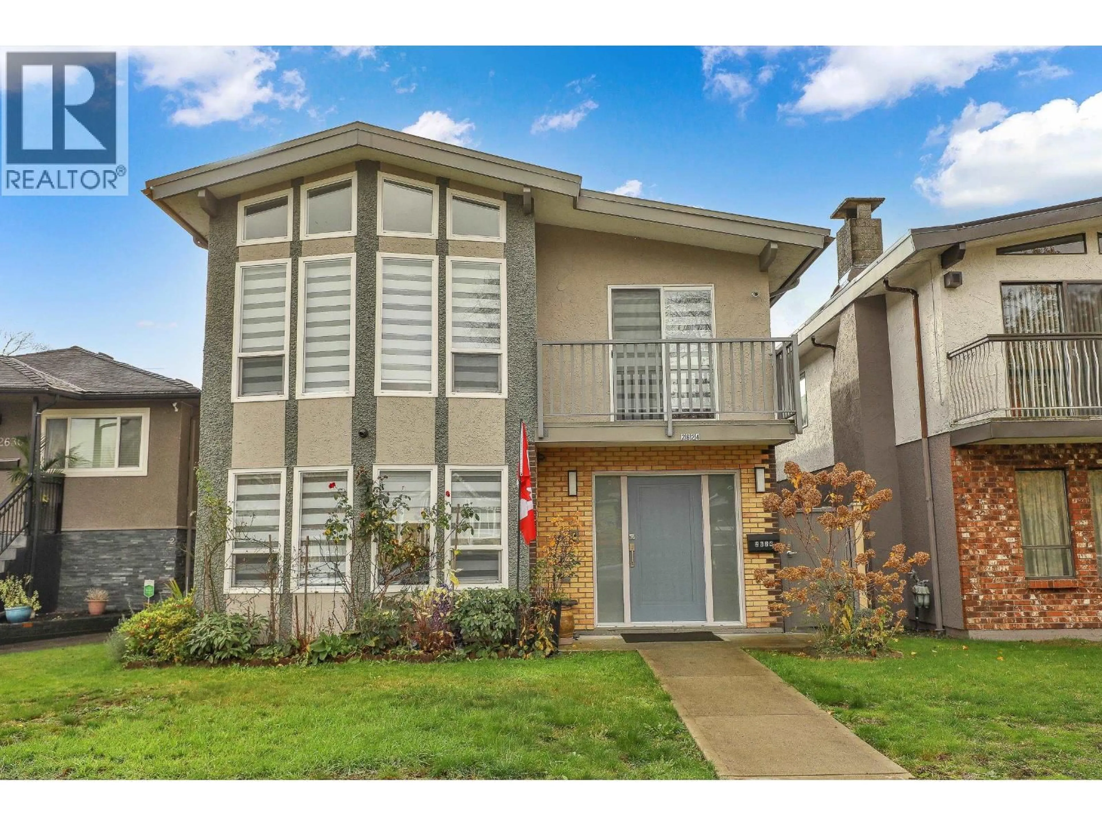 Home with vinyl exterior material, street for 2624 KITCHENER STREET, Vancouver British Columbia V5K3C8