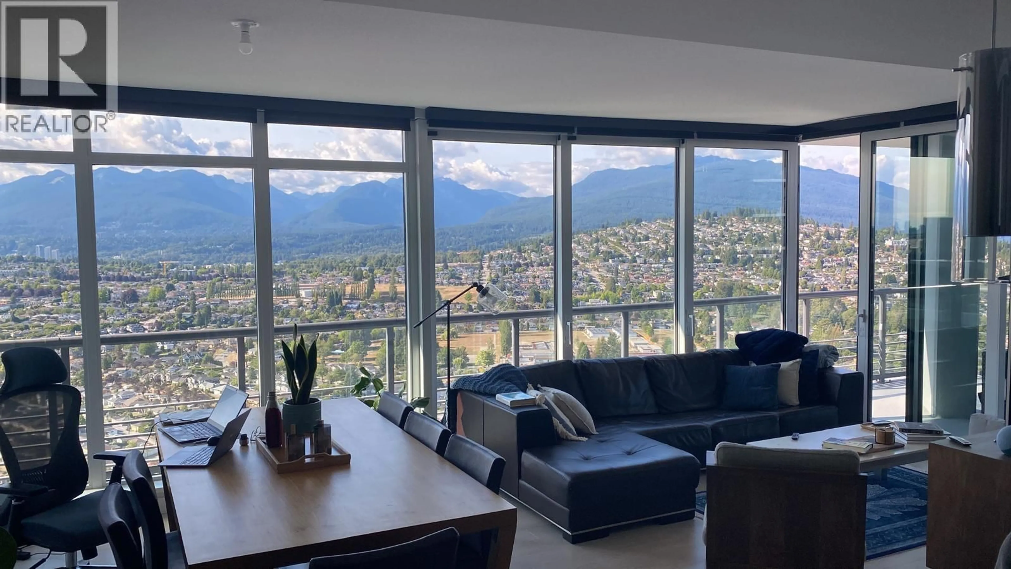 Living room with furniture, unknown for 4707 - 4730 LOUGHEED HIGHWAY, Burnaby British Columbia V5C0M9
