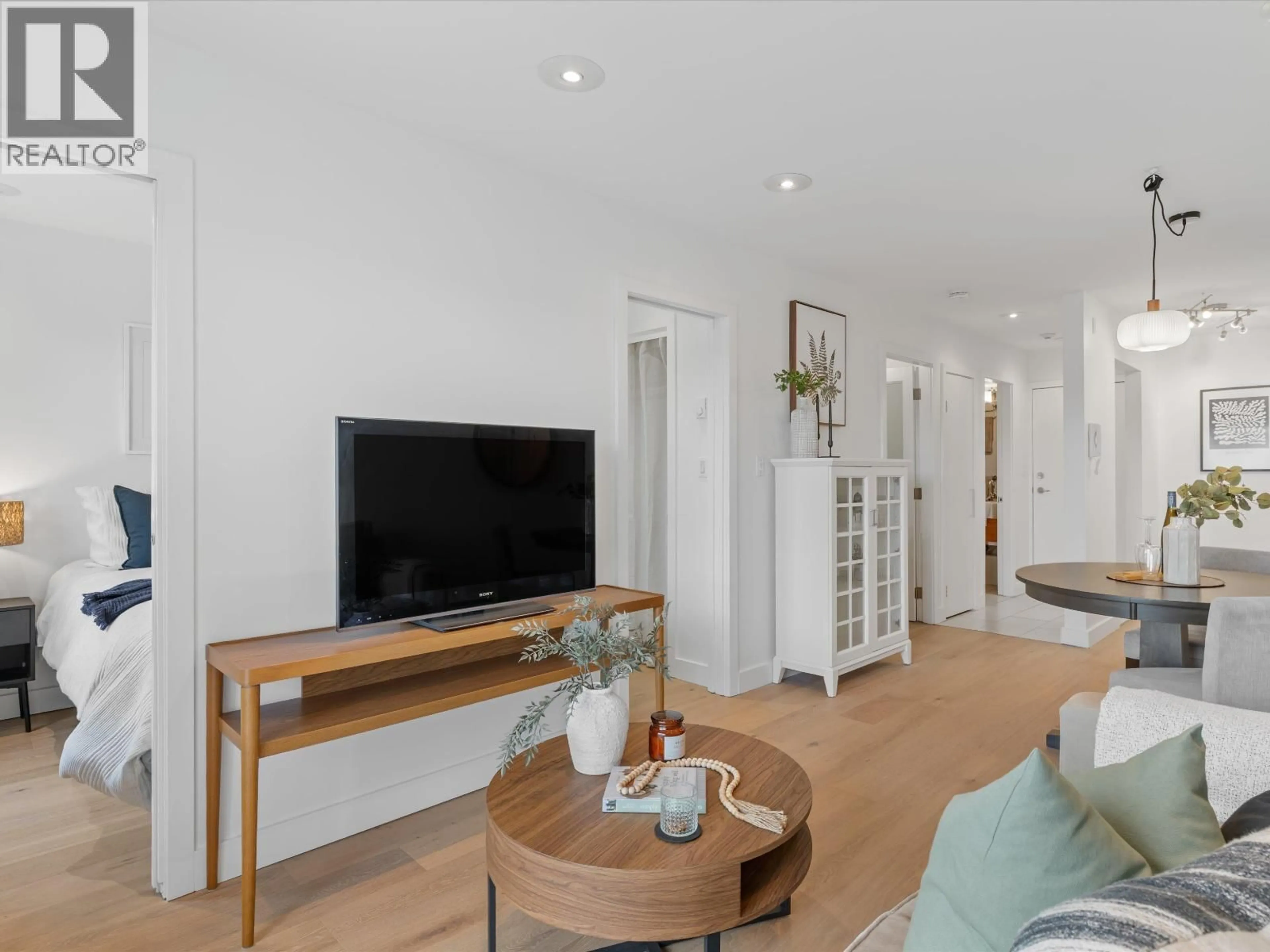 Living room with furniture, unknown for 201 - 4315 FRASER STREET, Vancouver British Columbia V5V4G4