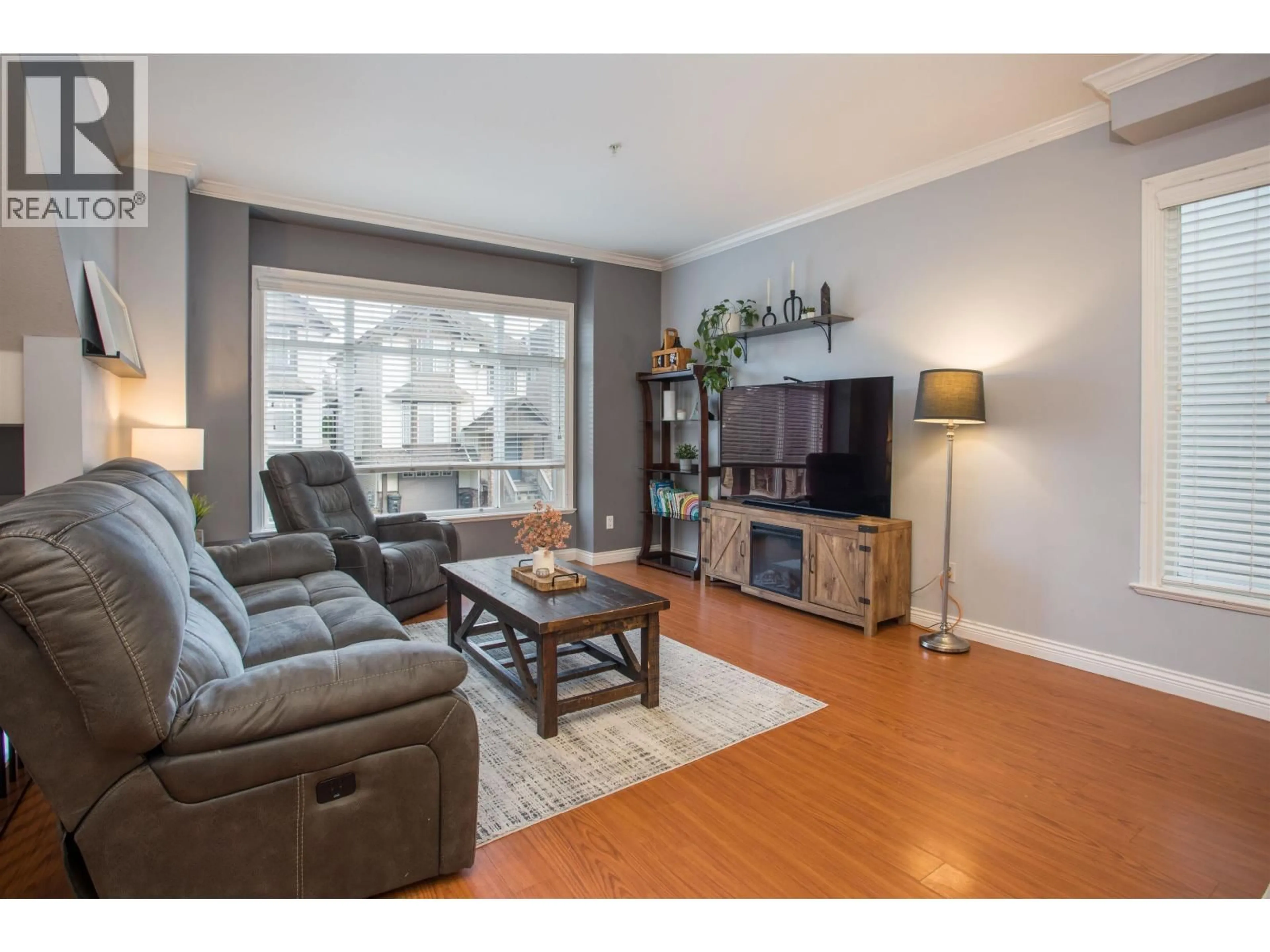 Living room with furniture, wood/laminate floor for 11847 191A STREET, Pitt Meadows British Columbia V3Y0A4