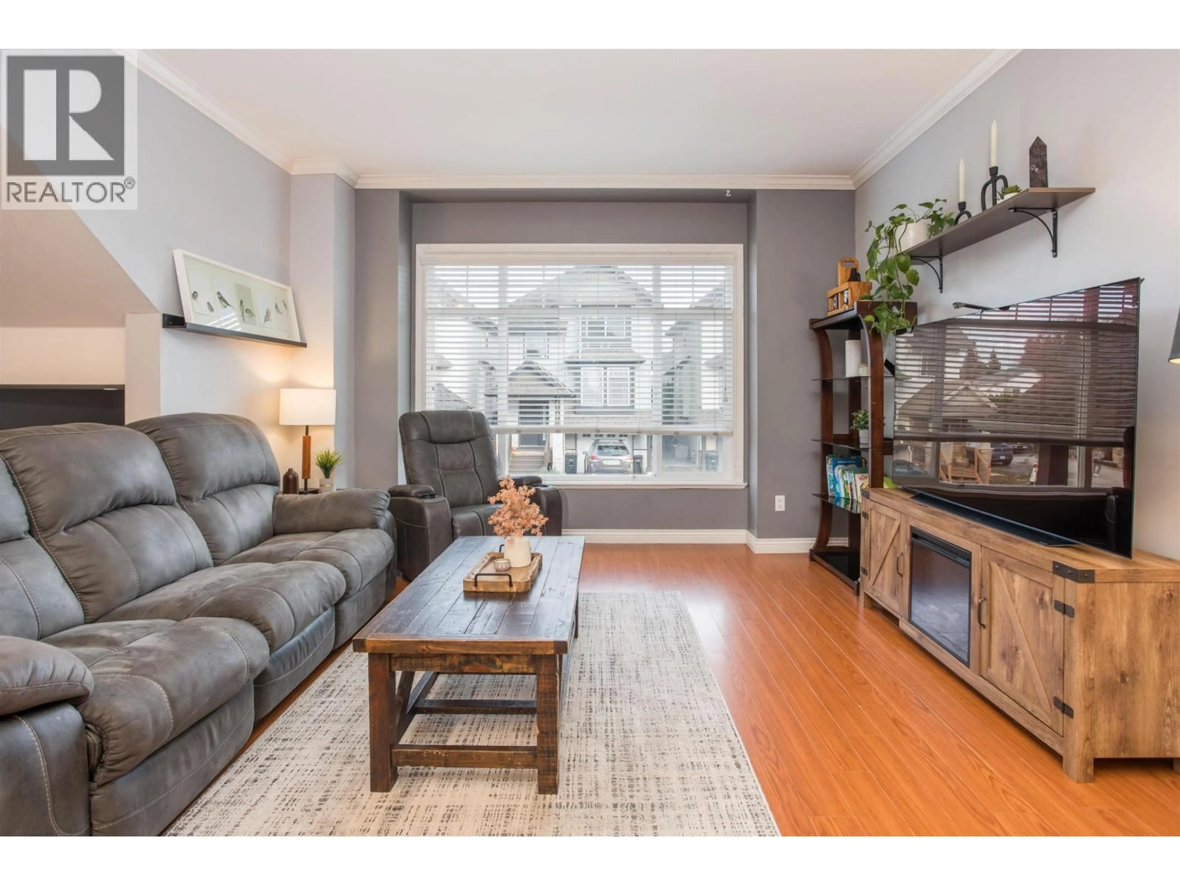Living room with furniture, wood/laminate floor for 11847 191A STREET, Pitt Meadows British Columbia V3Y0A4