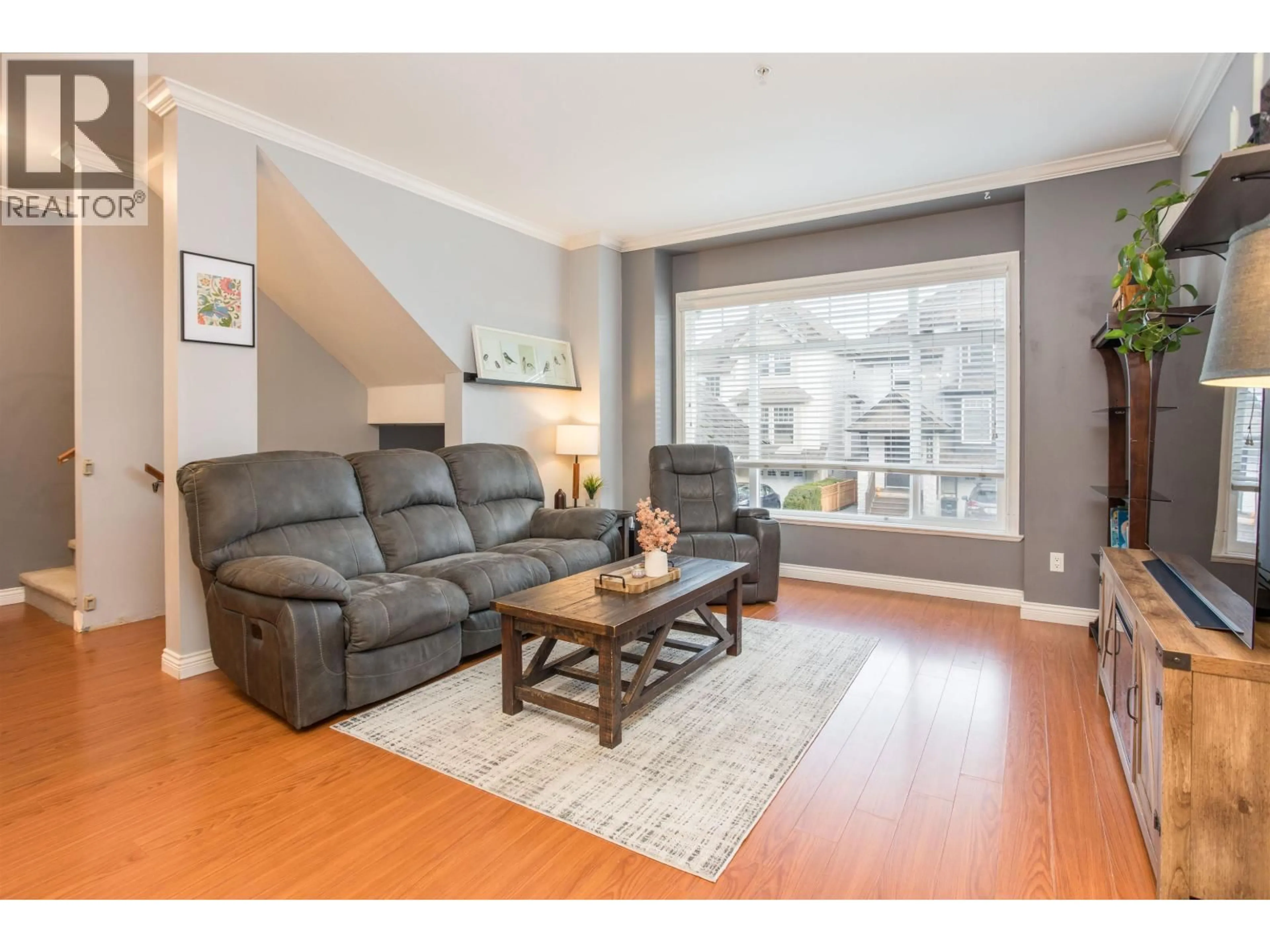 Living room with furniture, wood/laminate floor for 11847 191A STREET, Pitt Meadows British Columbia V3Y0A4
