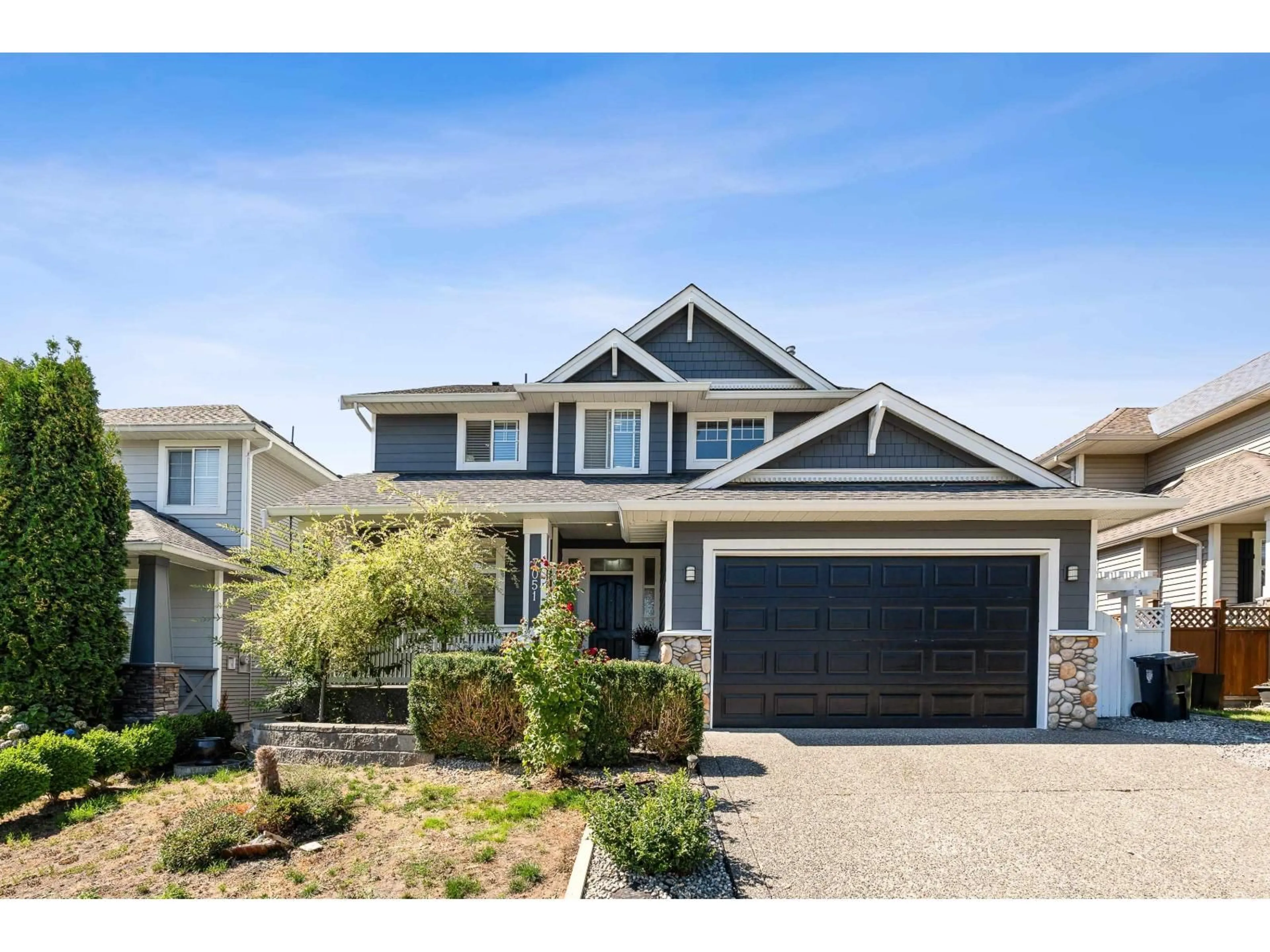 Home with vinyl exterior material, street for 7051 196B, Langley British Columbia V2Y2Z7