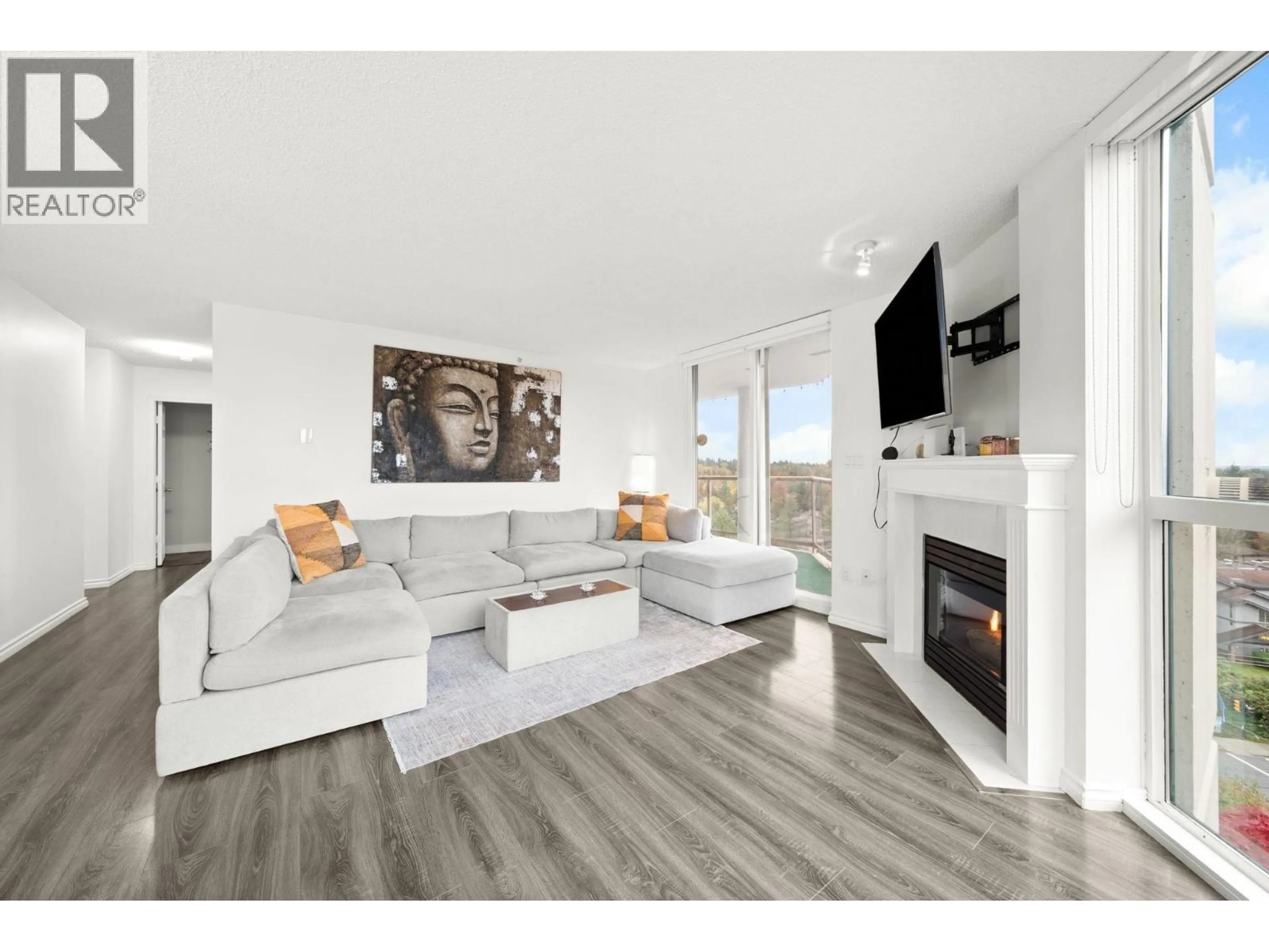 Living room with furniture, wood/laminate floor for 1002 - 1190 PIPELINE ROAD, Coquitlam British Columbia V3B7T9