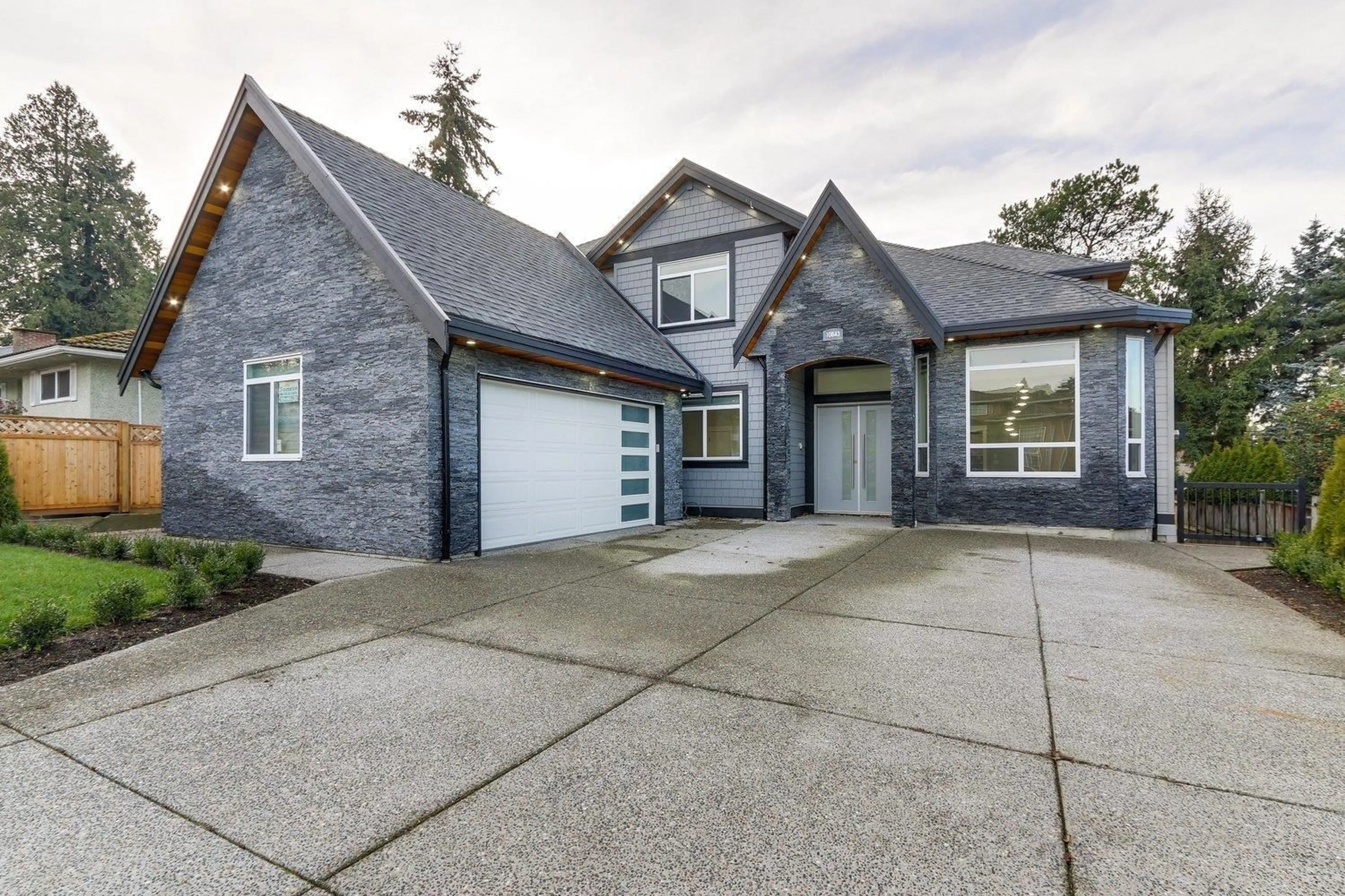 Home with brick exterior material, street for 10843 128A, Surrey British Columbia V3T3E9