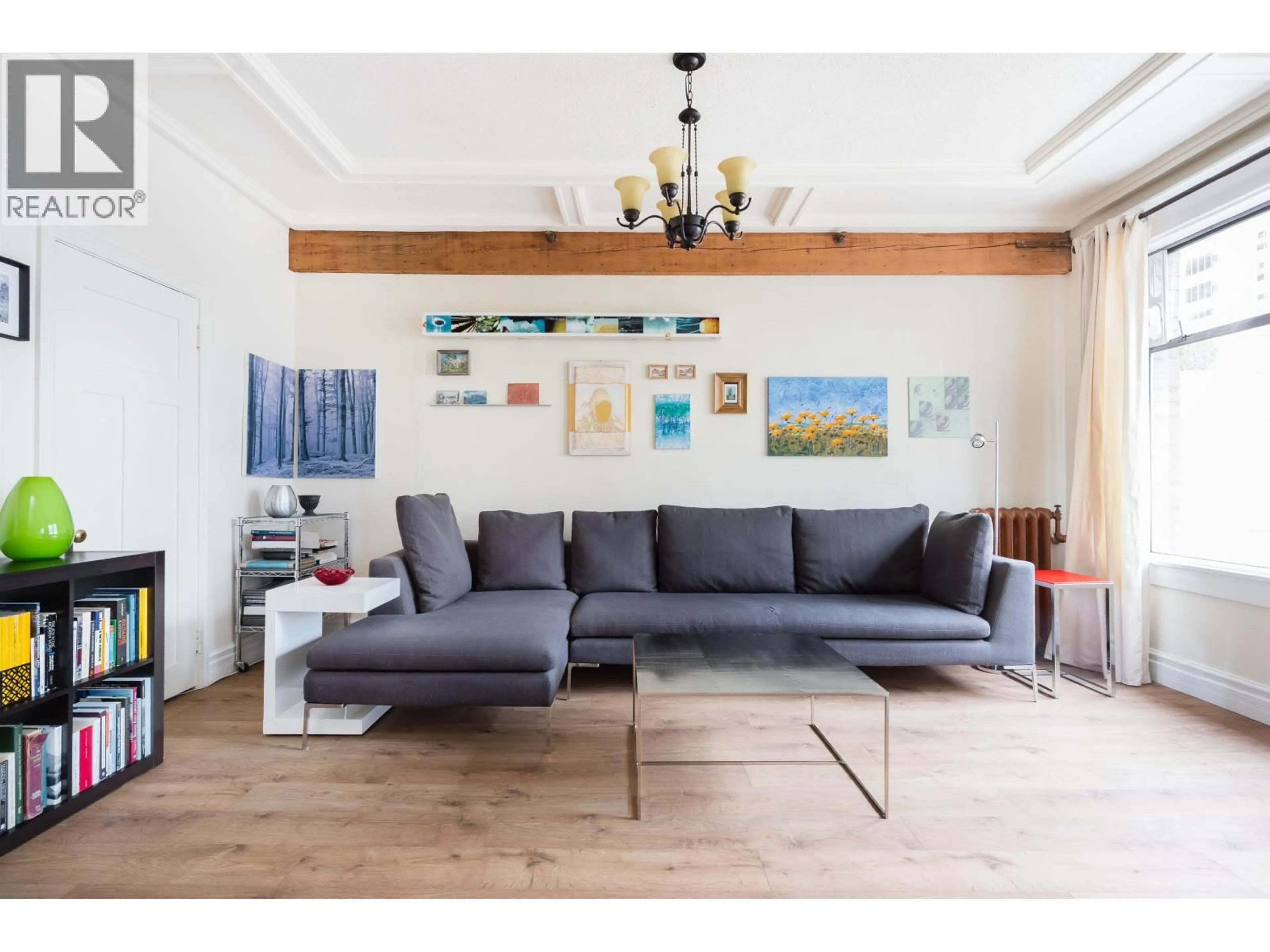 Living room with furniture, wood/laminate floor for 54 - 777 BURRARD STREET, Vancouver British Columbia V6Z1X7