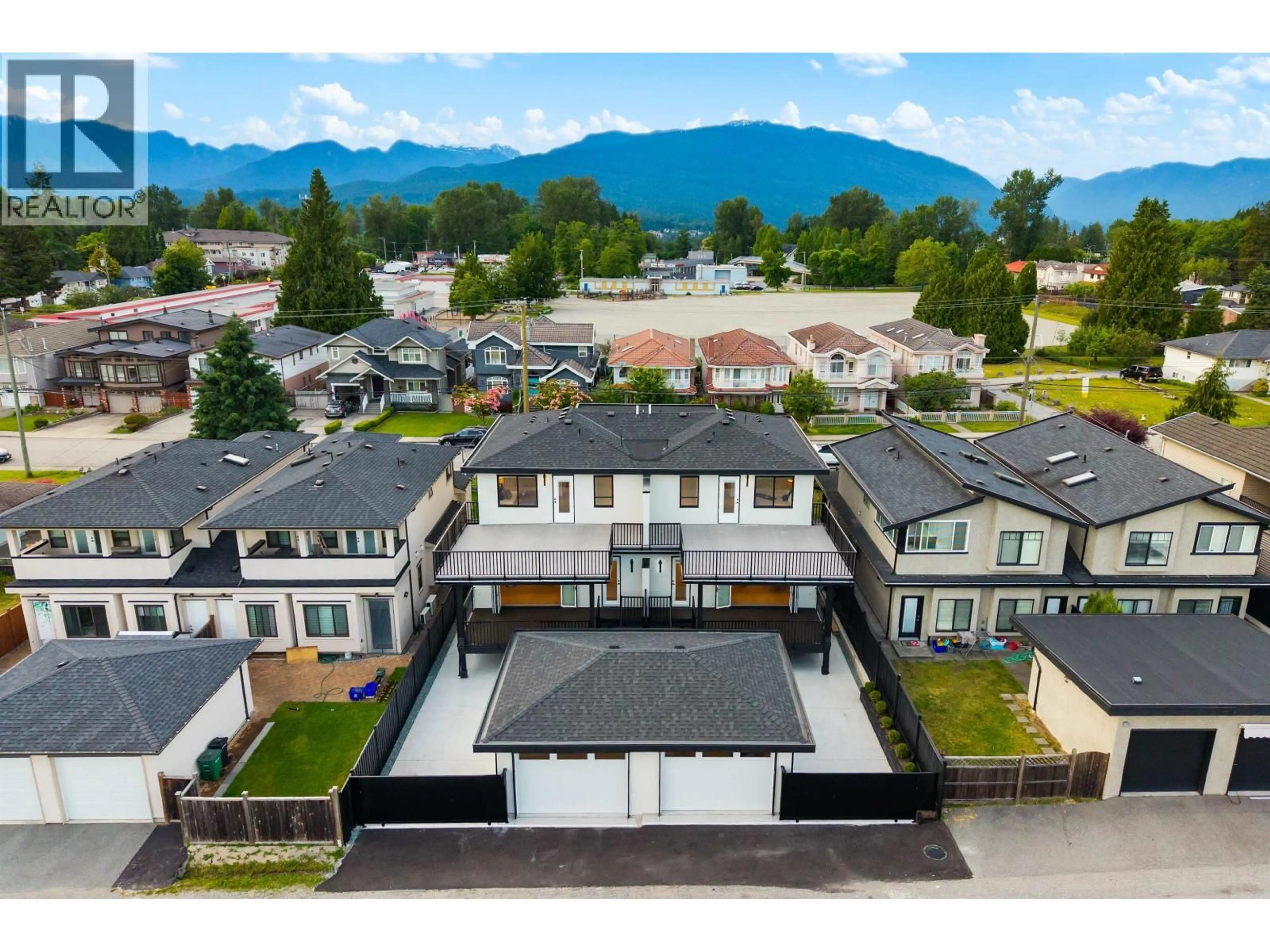 A pic from outside/outdoor area/front of a property/back of a property/a pic from drone, mountain view for 6916 UNION STREET, Burnaby British Columbia V5B1X5