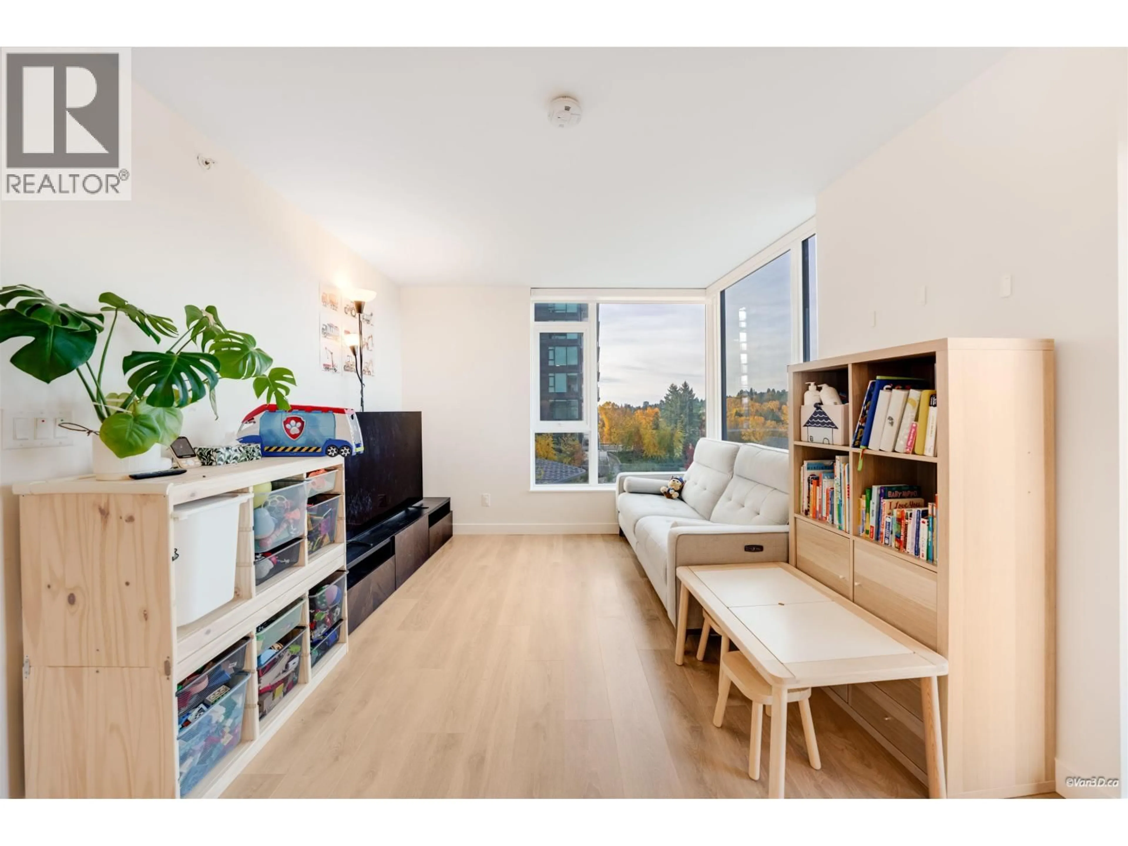 Living room with furniture, wood/laminate floor for 807 - 318 ALDERSON AVENUE, Coquitlam British Columbia V3K0J1