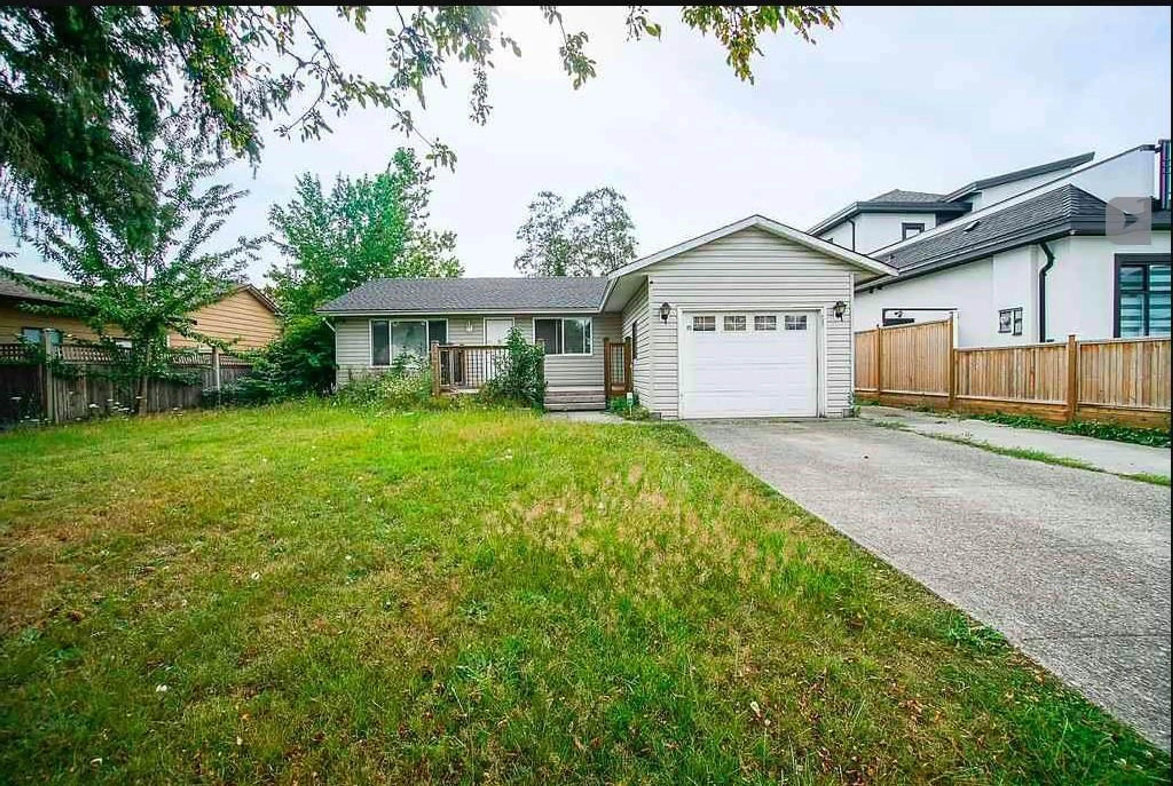 A pic from outside/outdoor area/front of a property/back of a property/a pic from drone, street for 6035 175A, Surrey British Columbia V3S5E9