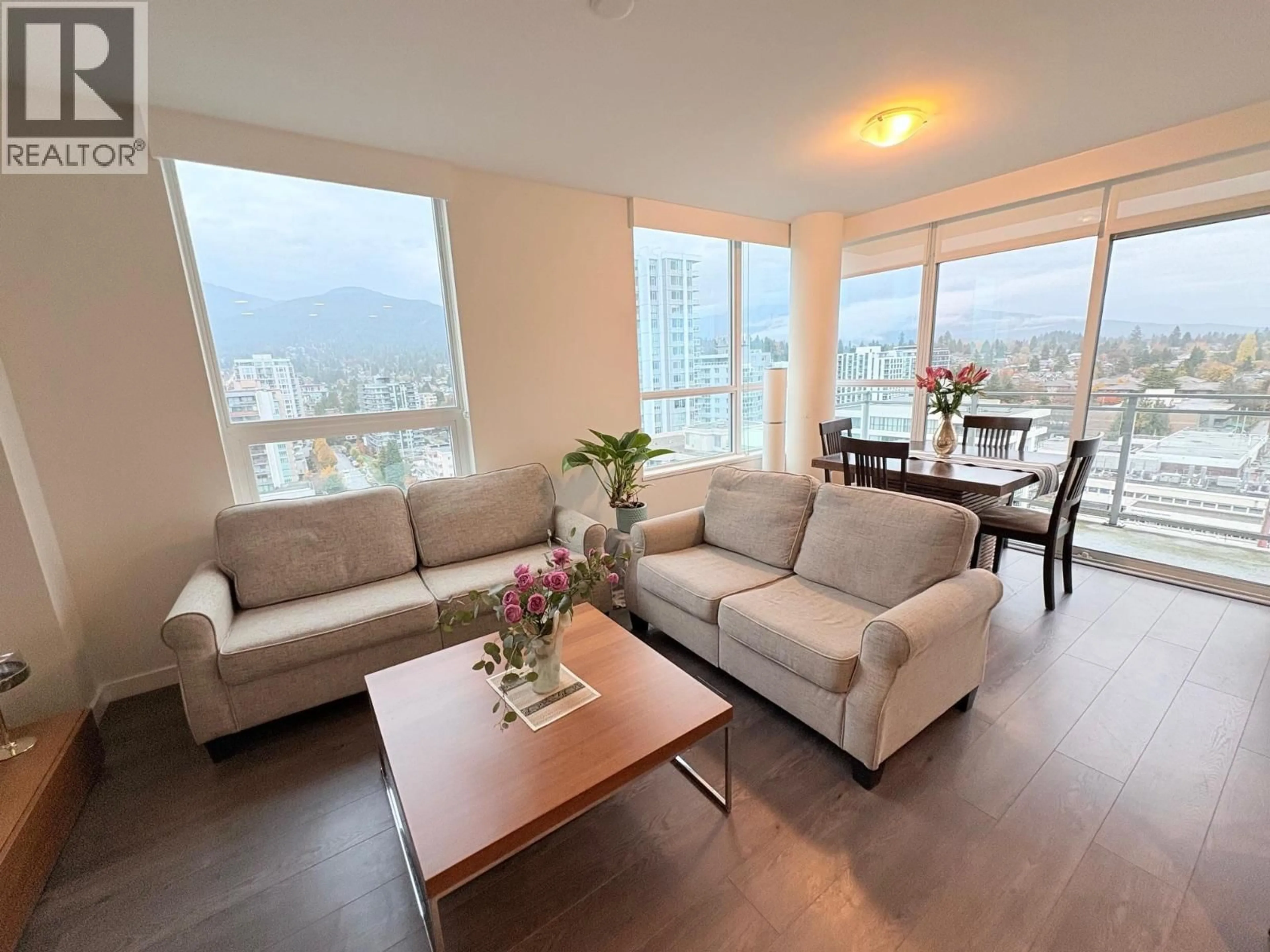 Living room with furniture, wood/laminate floor for 1609 - 125 14TH STREET, North Vancouver British Columbia V7L0E6