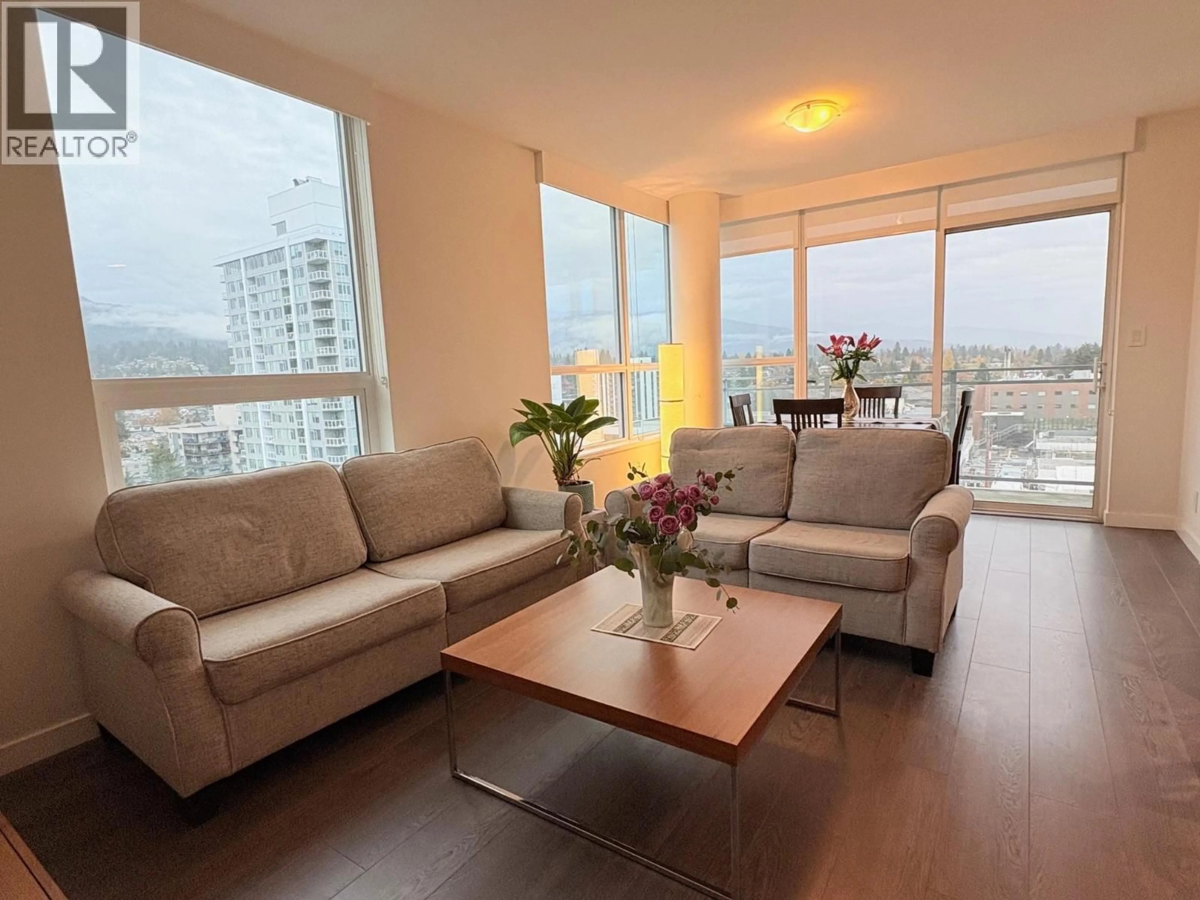 Living room with furniture, wood/laminate floor for 1609 - 125 14TH STREET, North Vancouver British Columbia V7L0E6