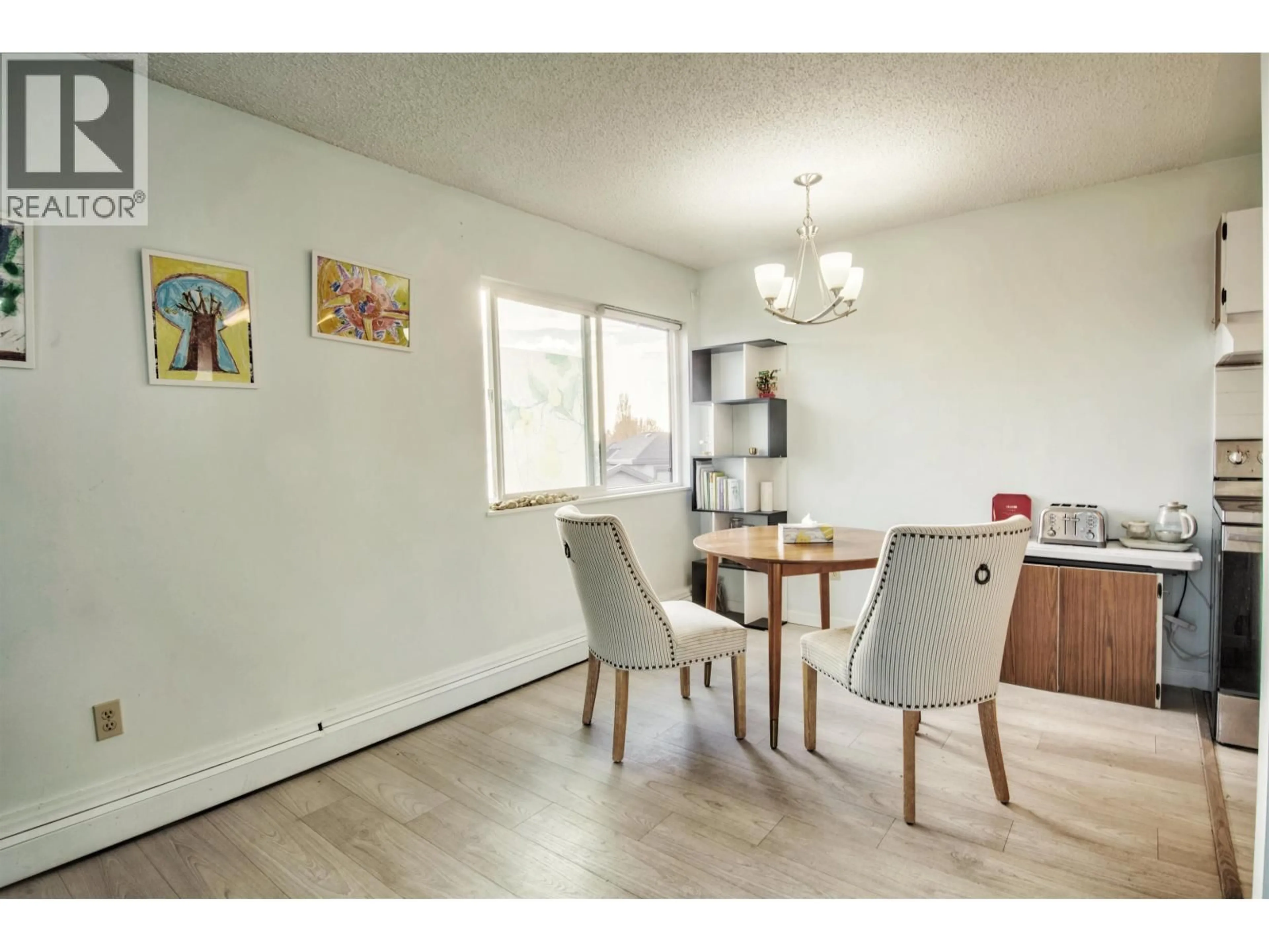Dining room, wood/laminate floor for 303 - 7240 LINDSAY ROAD, Richmond British Columbia V7C3N1