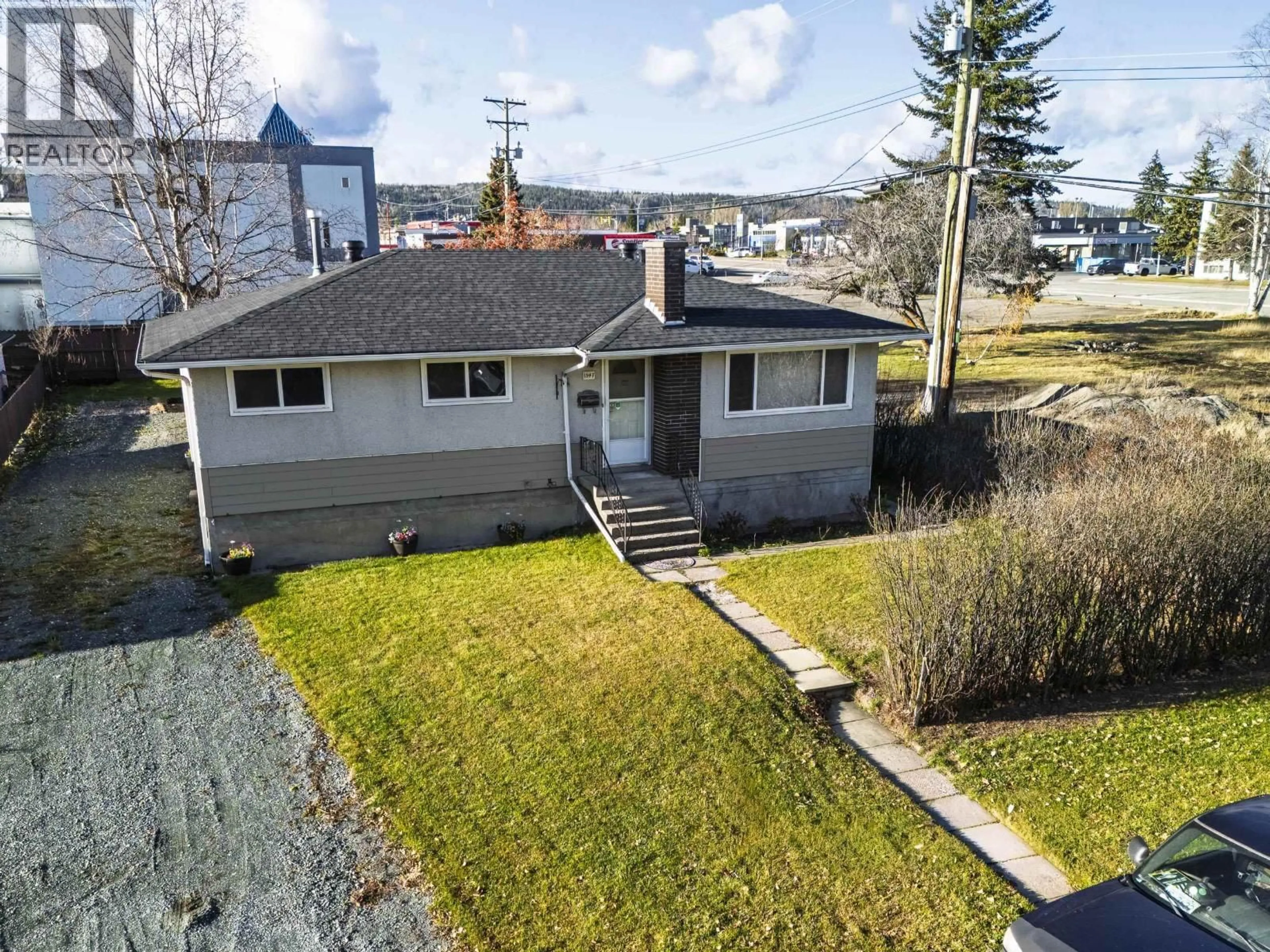 A pic from outside/outdoor area/front of a property/back of a property/a pic from drone, street for 1547 IRWIN STREET, Prince George British Columbia V2M2Y6