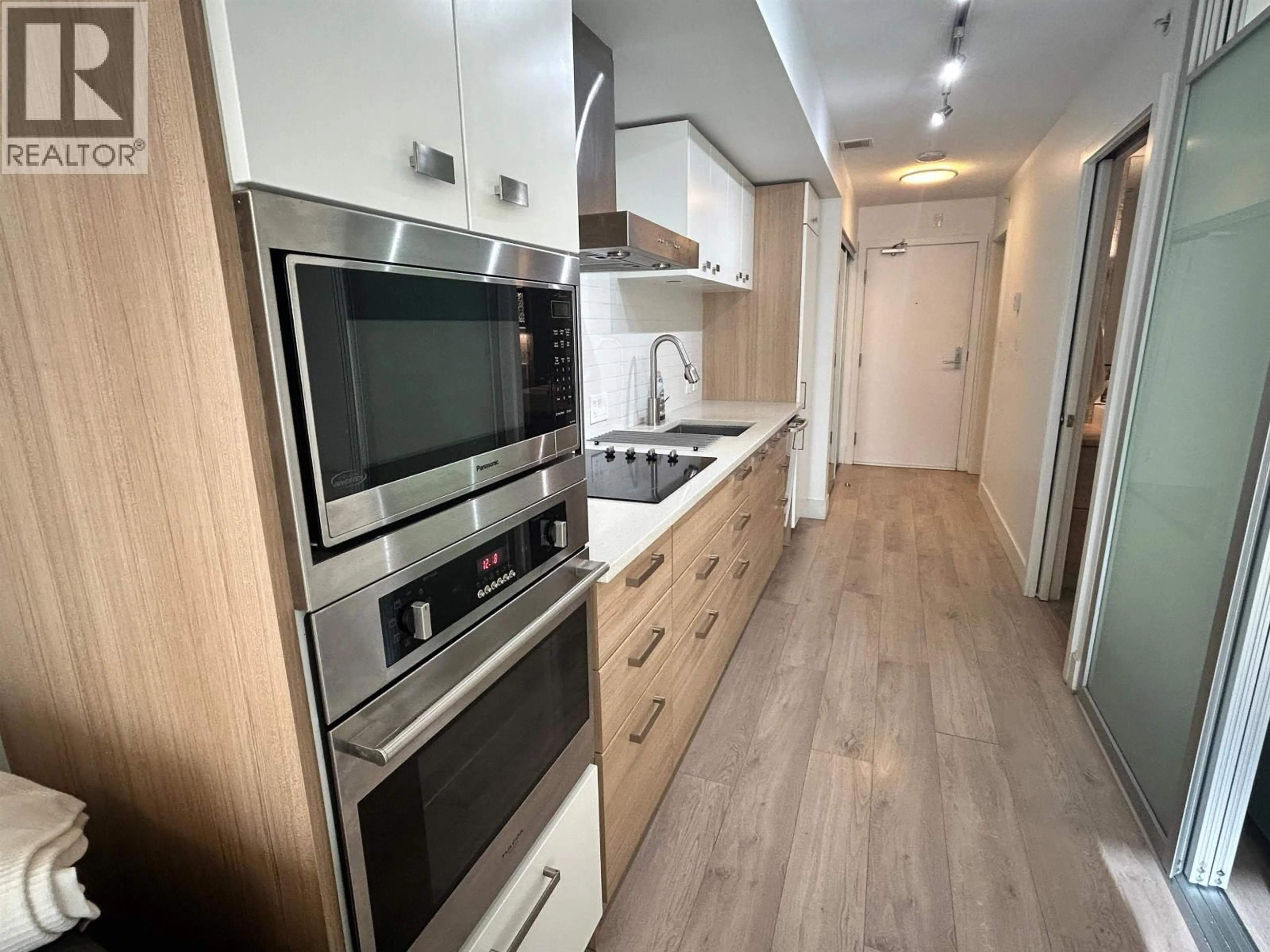 Standard kitchen, wood/laminate floor for 208 - 1783 MANITOBA STREET, Vancouver British Columbia V5Y0G9