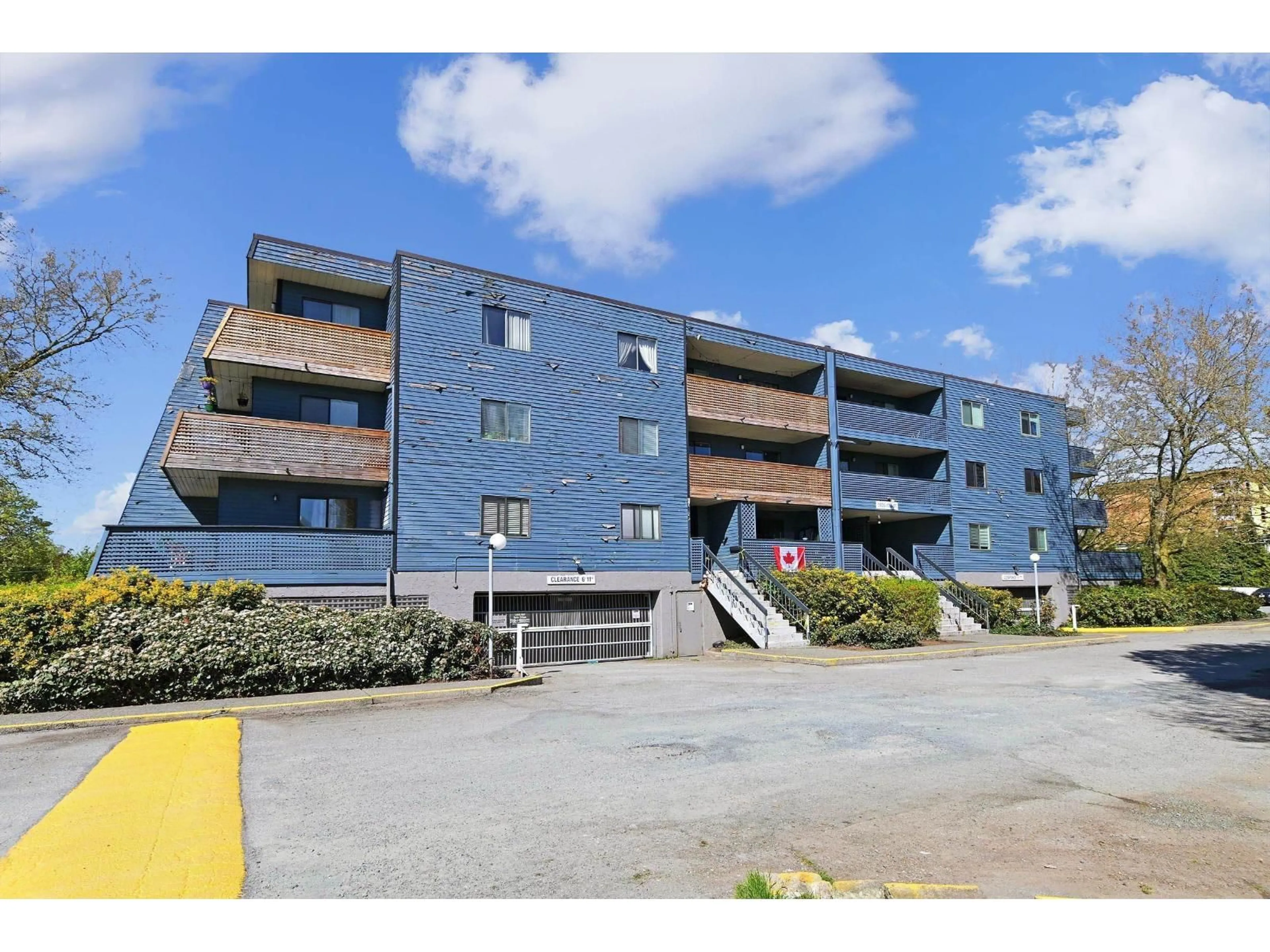 A pic from outside/outdoor area/front of a property/back of a property/a pic from drone, unknown for 310 - 5906 176A, Surrey British Columbia V3S4H7