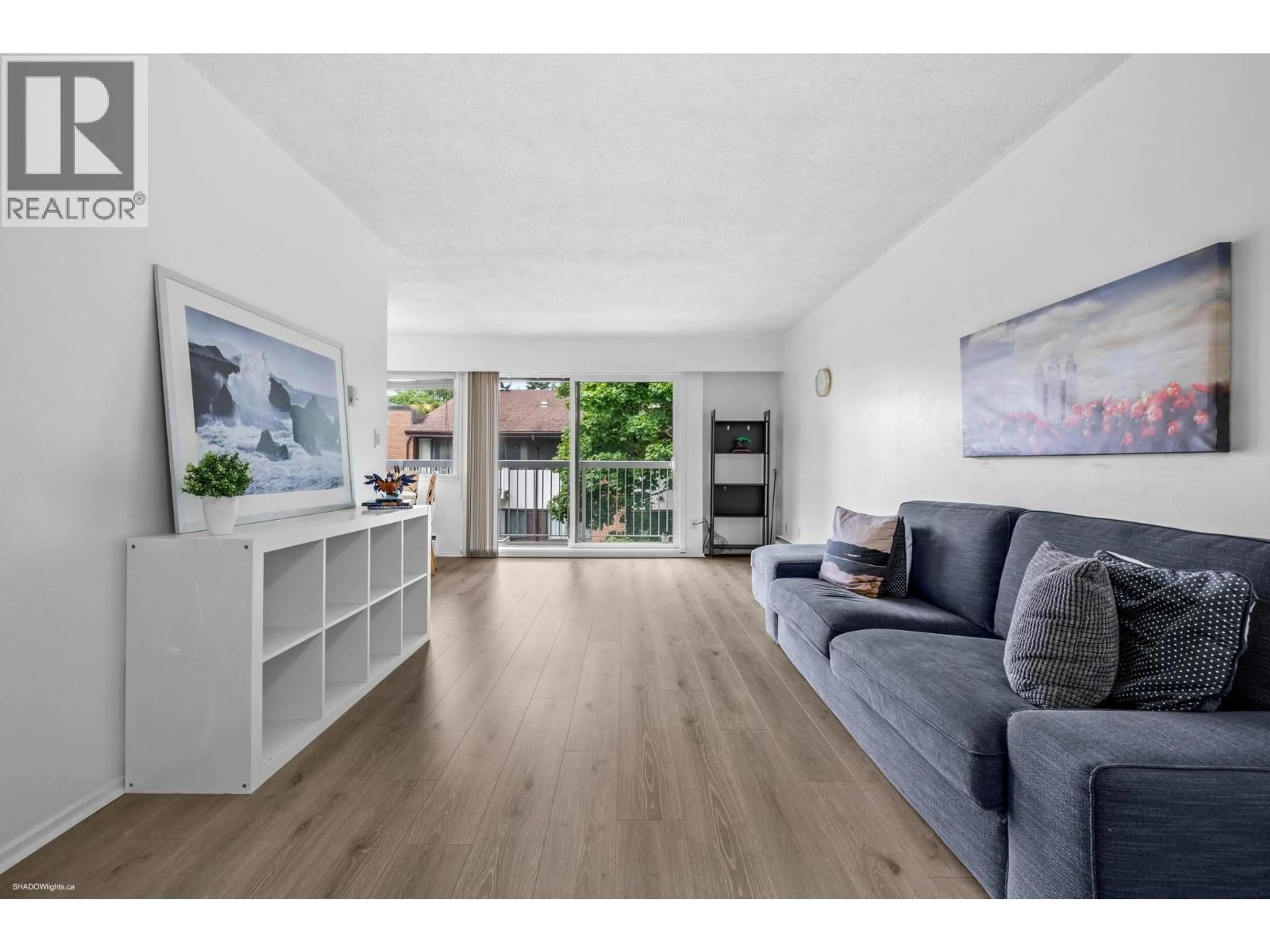 Living room with furniture, wood/laminate floor for 308 - 8040 RYAN ROAD, Richmond British Columbia V7A2E5