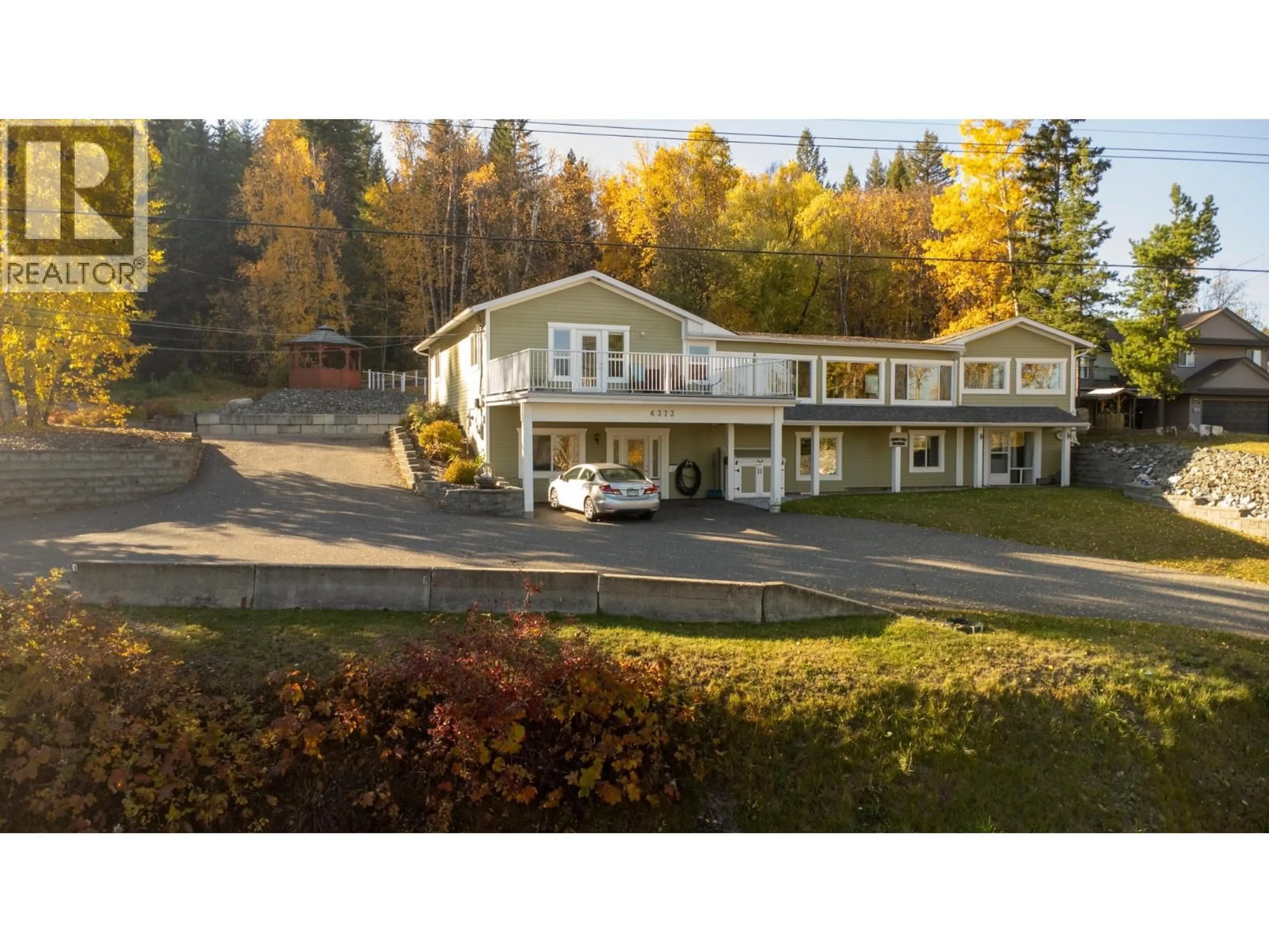 A pic from outside/outdoor area/front of a property/back of a property/a pic from drone, mountain view for 6373 HILLCREST PLACE, Prince George British Columbia V2N5R1