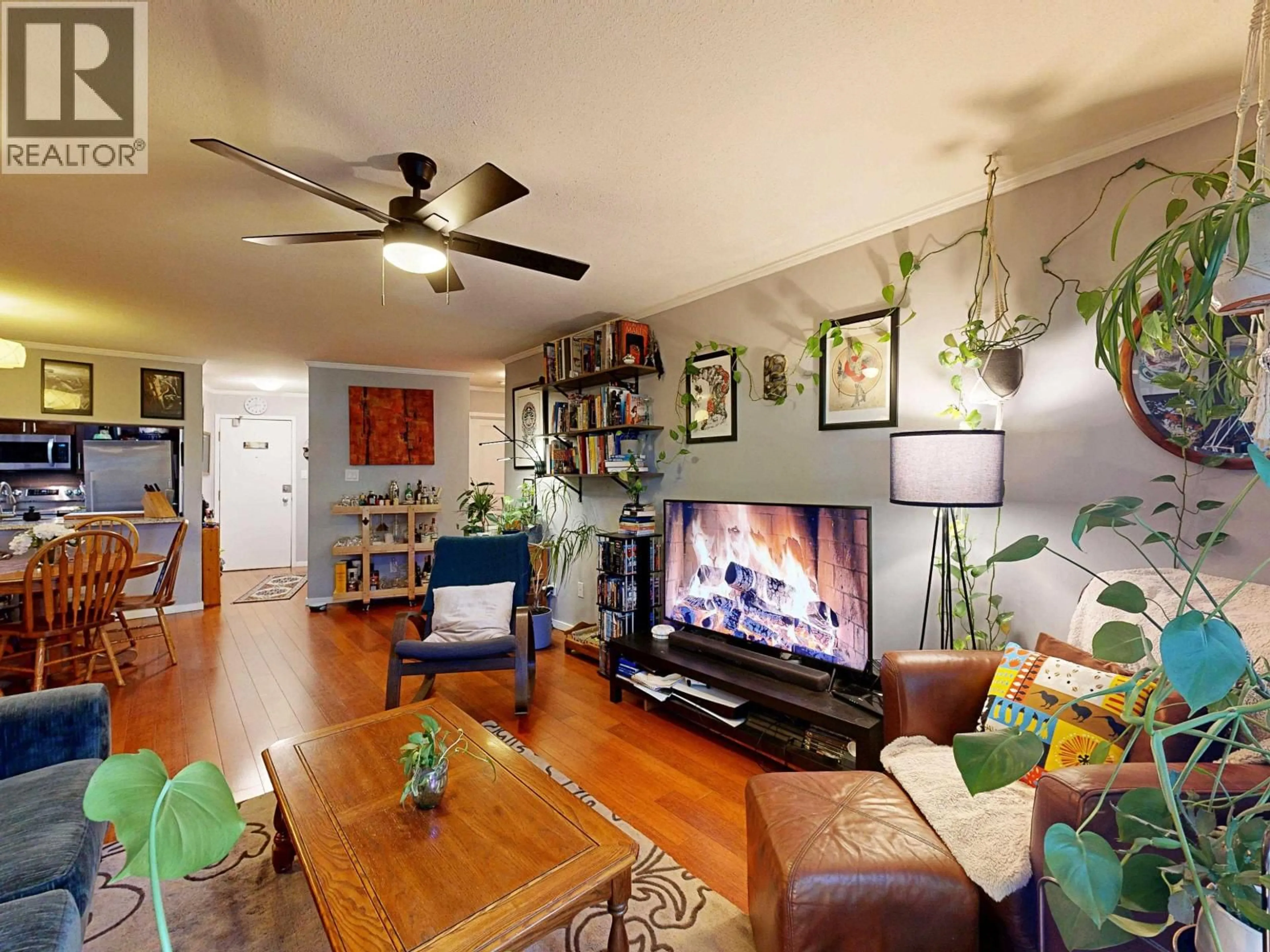 Living room with furniture, wood/laminate floor for 201 - 2222 PRINCE EDWARD STREET, Vancouver British Columbia V5T4M6