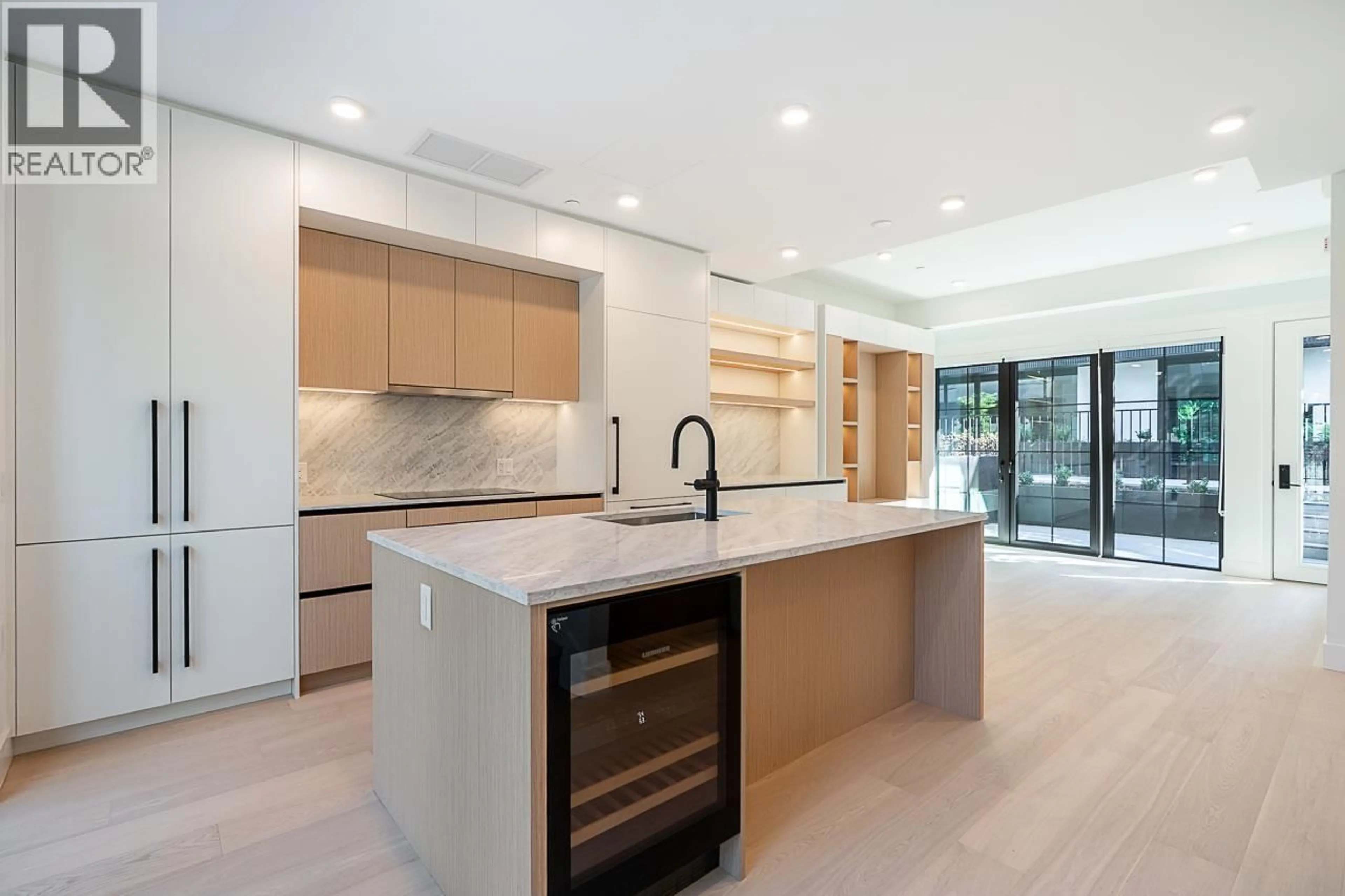 Open concept kitchen, unknown for 107 - 551 28TH AVENUE, Vancouver British Columbia V5Z2H2