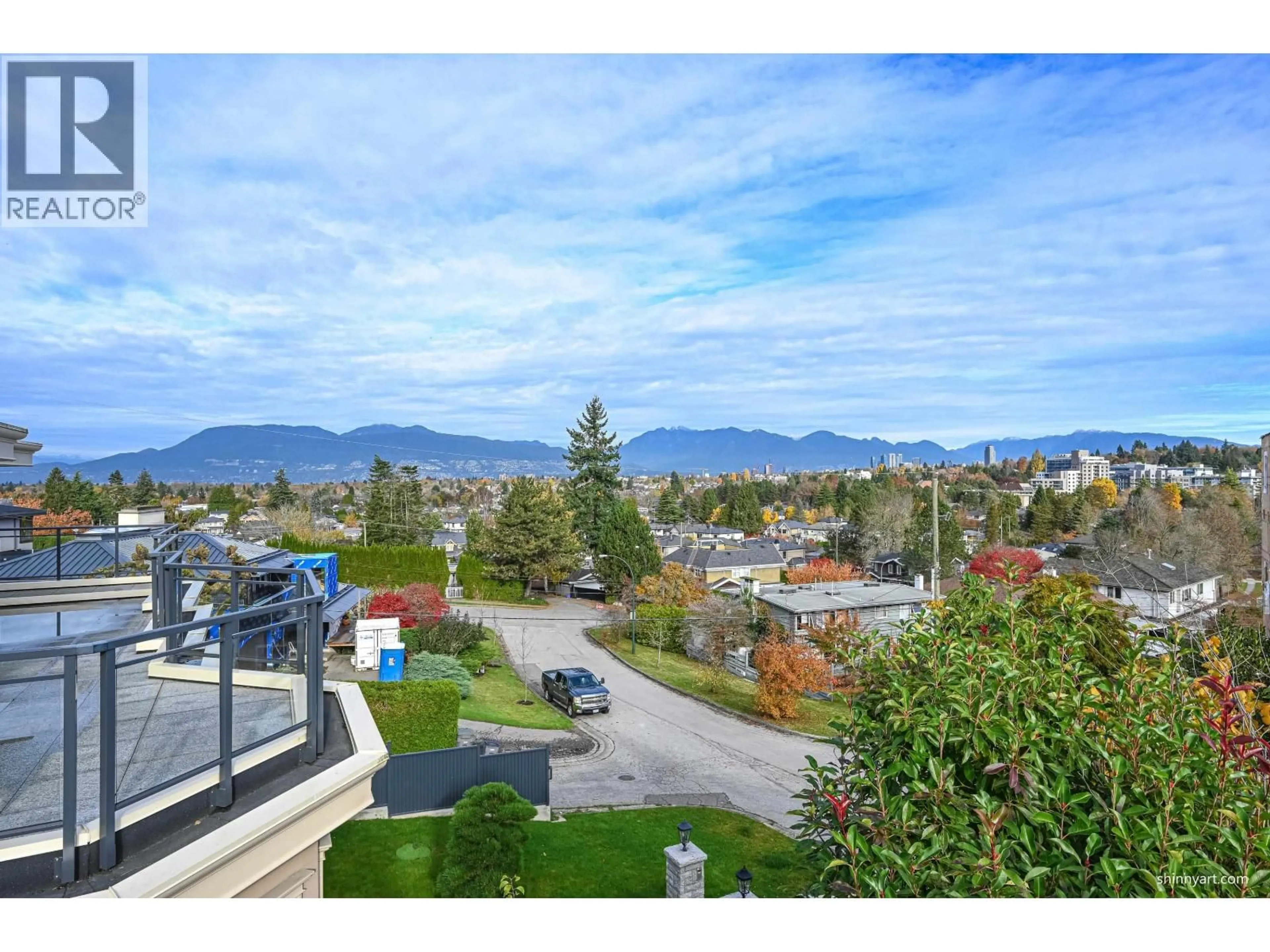A pic from outside/outdoor area/front of a property/back of a property/a pic from drone, mountain view for 4729 PATON STREET, Vancouver British Columbia V6L2H9